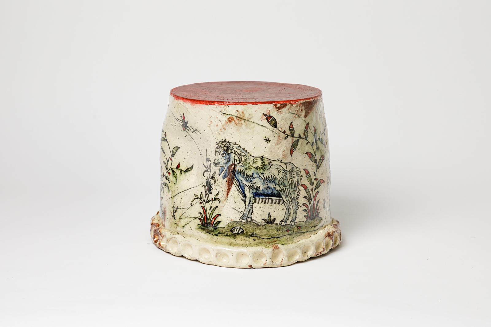 Glazed earthenware table or stool, decorated with a ram by Jérôme Galvin. 
Artist’s signature at the base. 2025. Unique piece.
H: 10.8 × 11 × 11.4 inches.