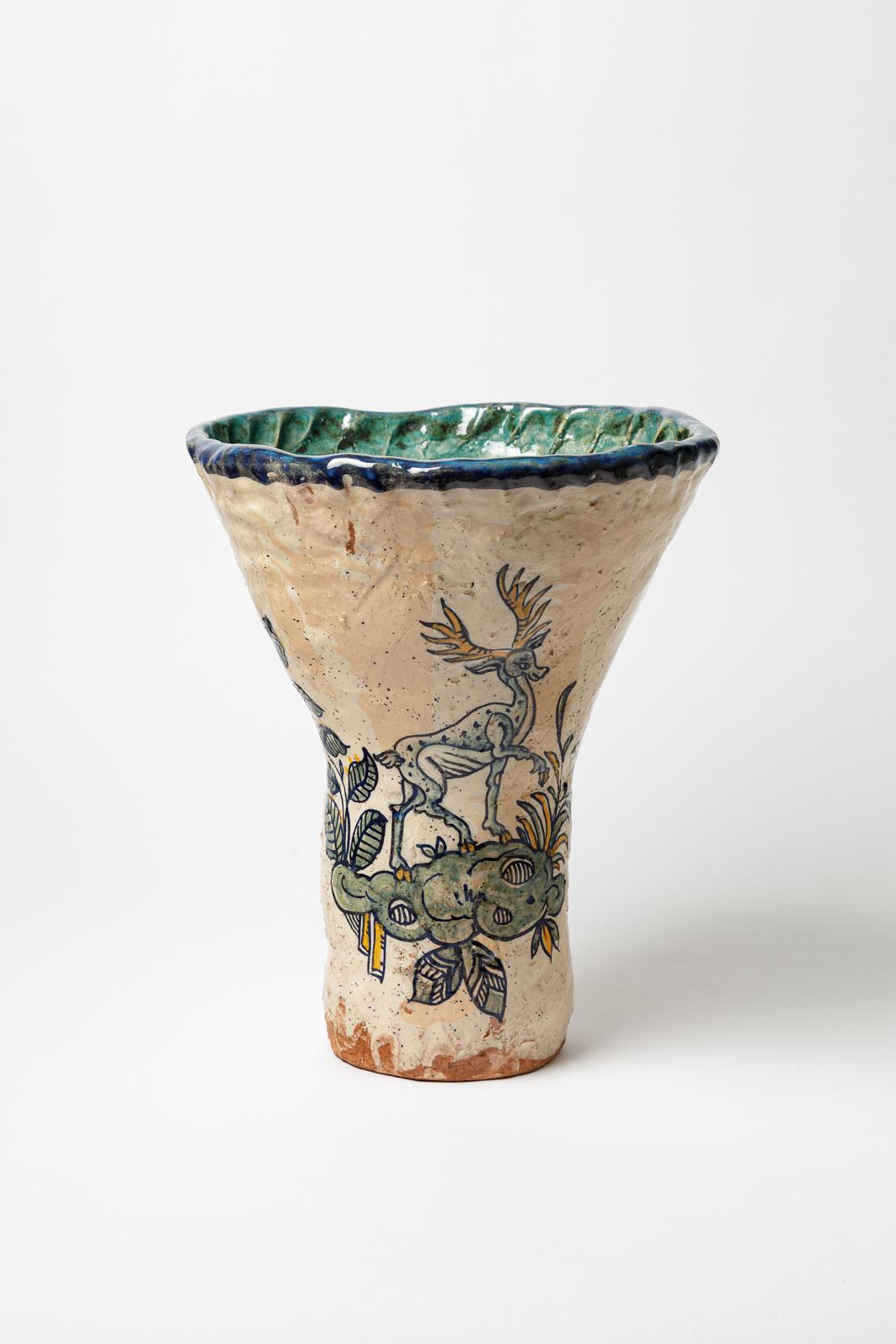 Glazed earthenware vase, decorated with fantastical animals by Jerome Galvin.
Artist’s signature at the base «J.Galvin». 2020. Unique piece.
H: 14.6 × 14.2 × 13.8 inches.