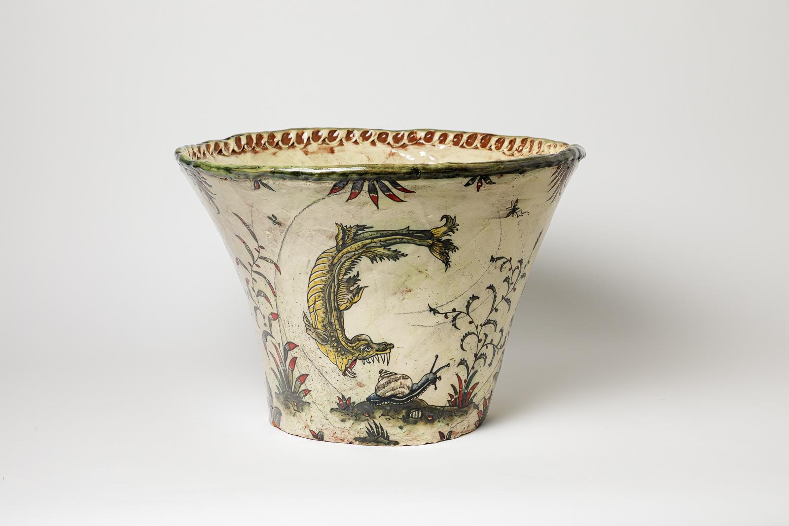 Glazed earthenware vase, decorated with fantastical animals by Jérôme Galvin. 
Artist’s signature at the base «J.Galvin Moustiers». 2025. Unique piece.
H: 10.8 × 11.0 × 11.4 inches.