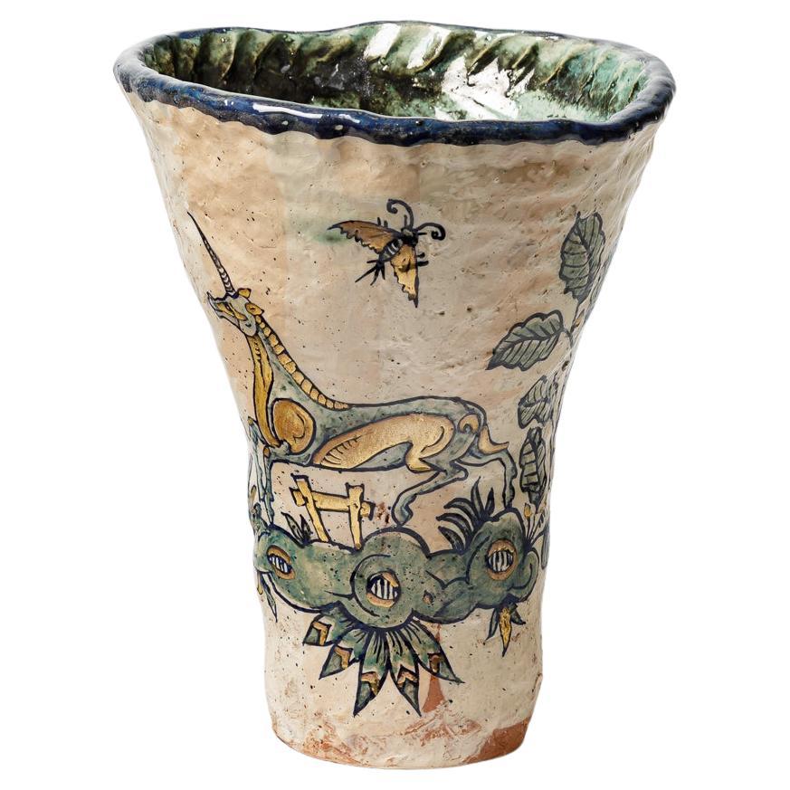 Glazed earthenware vase, decorated with fantastical animals by Jerome Galvin.
