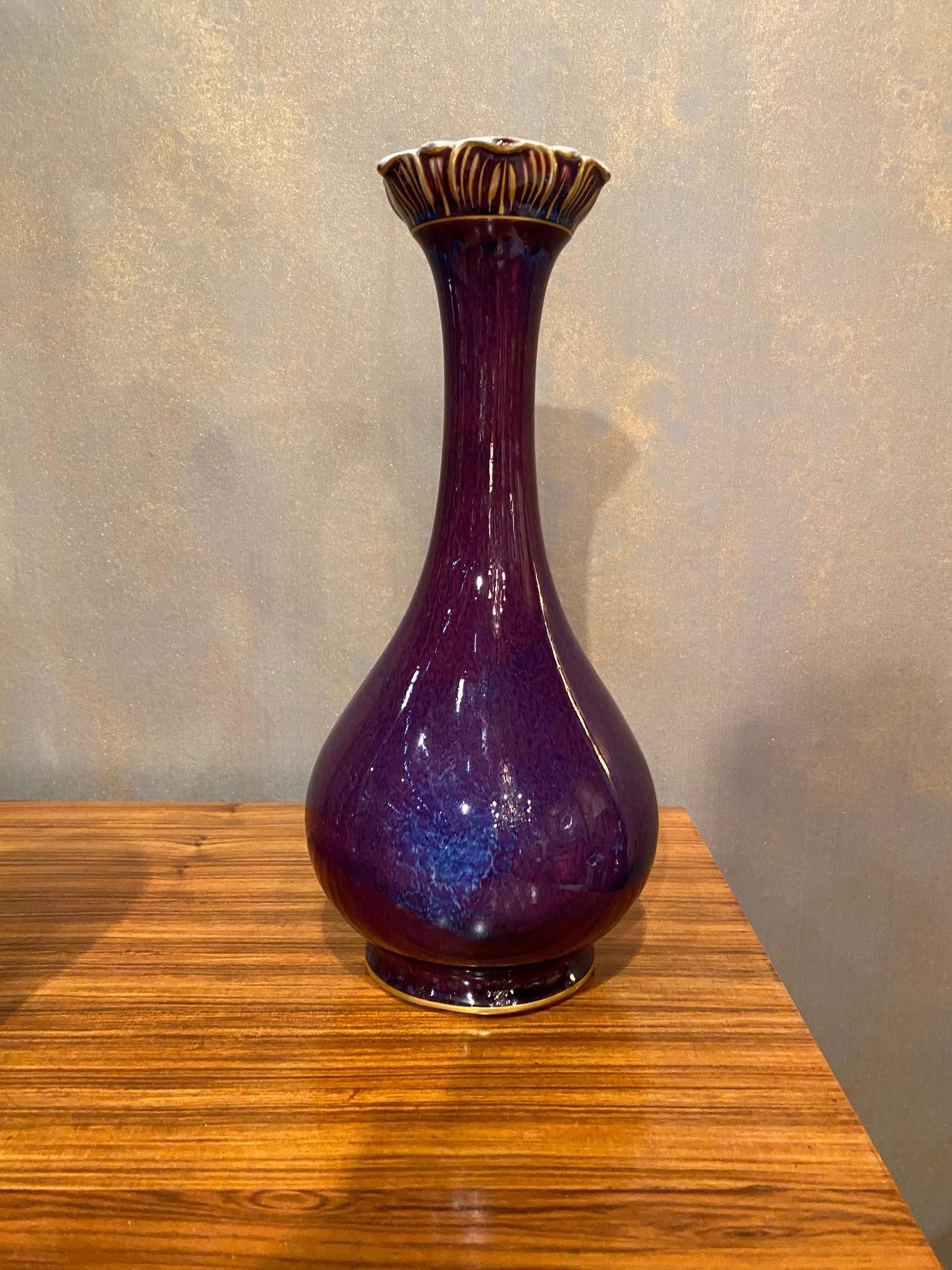 Glazed oxblood vase by Hermann Seger for KPM. Ink-stamped manufacturer's mark to underside of smaller example 'S.gr.P' with scepter mark and incised number 'PM 3060'. Germany: circa 1890 Hermann August Seger (1839-1893), produced numerous glaze and