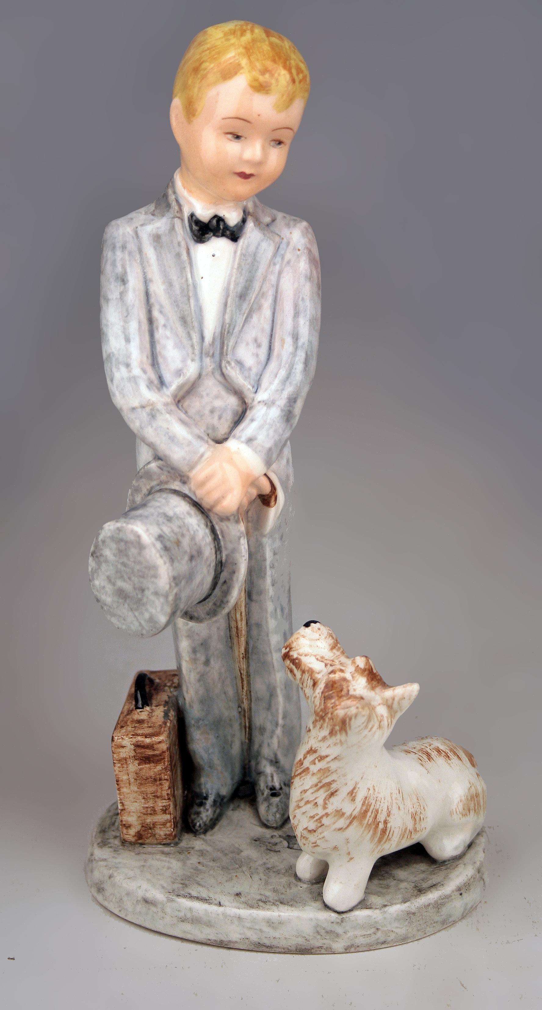 Mid-20th century hand-painted glazed porcelain figurine of boy and dog by Marcel Goldscheider for Myott Son & Co.

By: Marcel Goldscheider, Myott Son & Co
Material: porcelain, paint, ceramic
Technique: glazed, hand-painted, pressed, molded, painted,