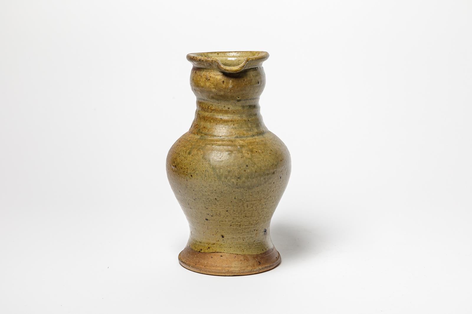 Beaux Arts Glazed stoneware pitcher by Pierre Digan, circa 1970-1980. For Sale