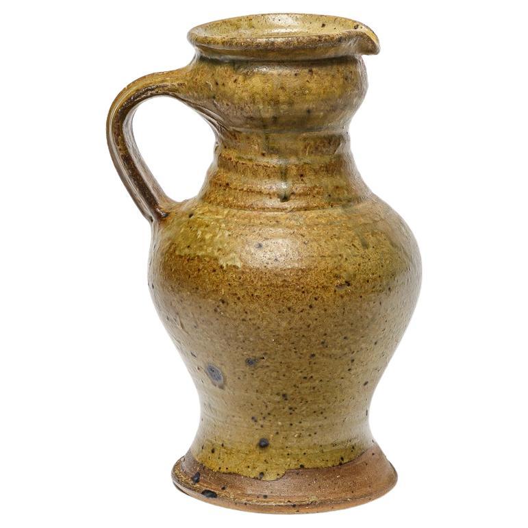 Glazed stoneware pitcher by Pierre Digan, circa 1970-1980. For Sale