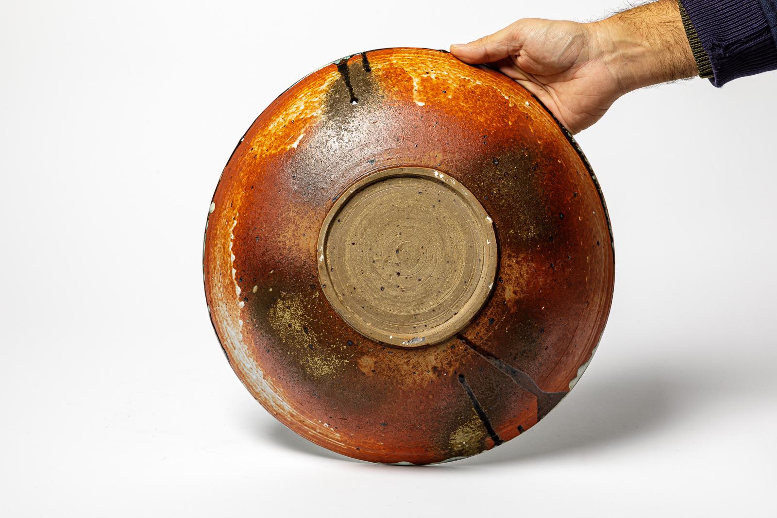 Late 20th Century Glazed stoneware plate by Raoul Favretto, circa 1980-1990. For Sale