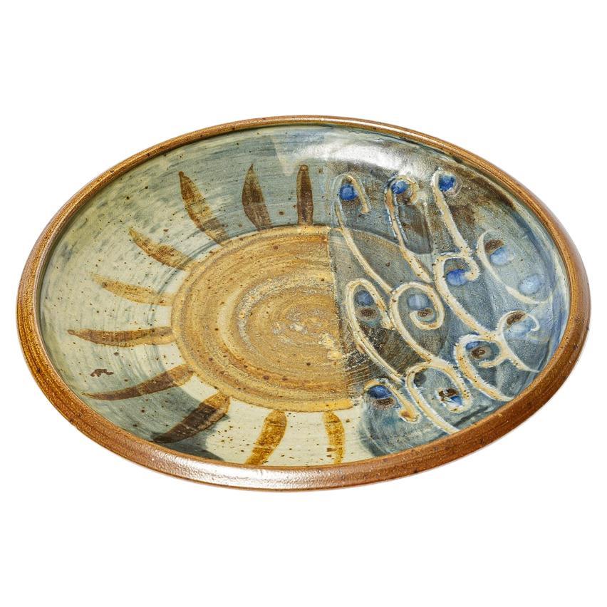 Glazed stoneware plate, France. For Sale