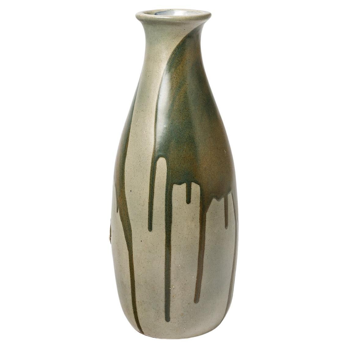 Glazed stoneware vase with dripping decoration by Jean Pointu, circa 1950. For Sale