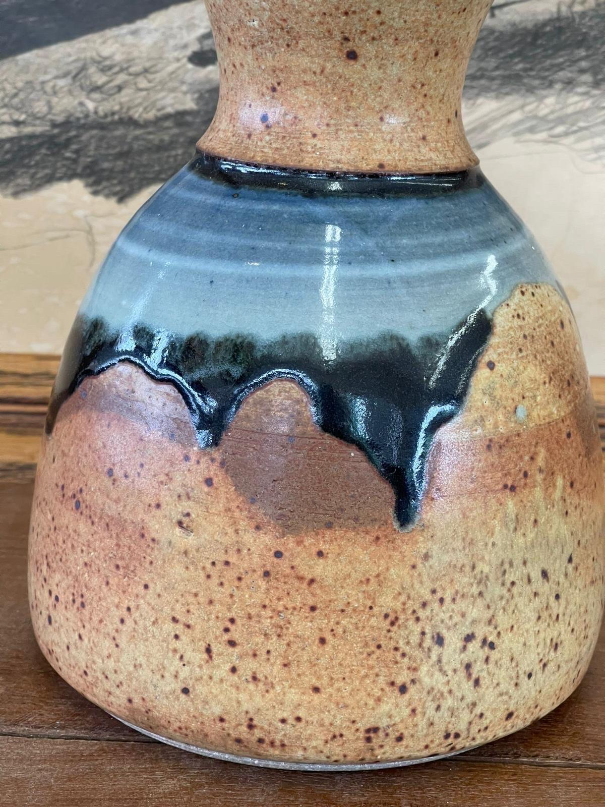 Glazed Studio Pottery Vase

Dimensions. 6 W ; 5 D ; 8 1/2 H.