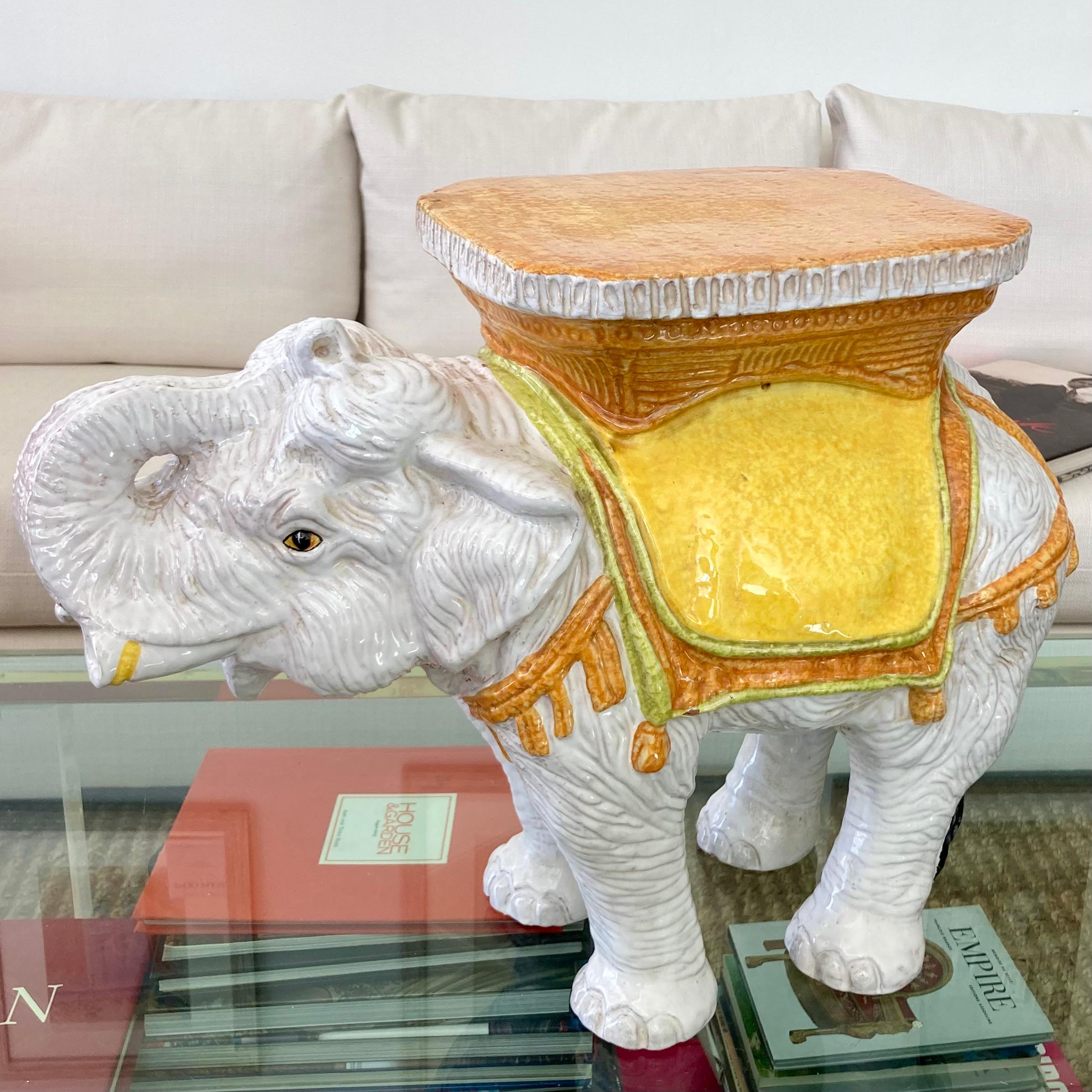 Beautiful glazed terra cotta elephant garden seat. Great addition to your patio and garden for drinks and snacks.