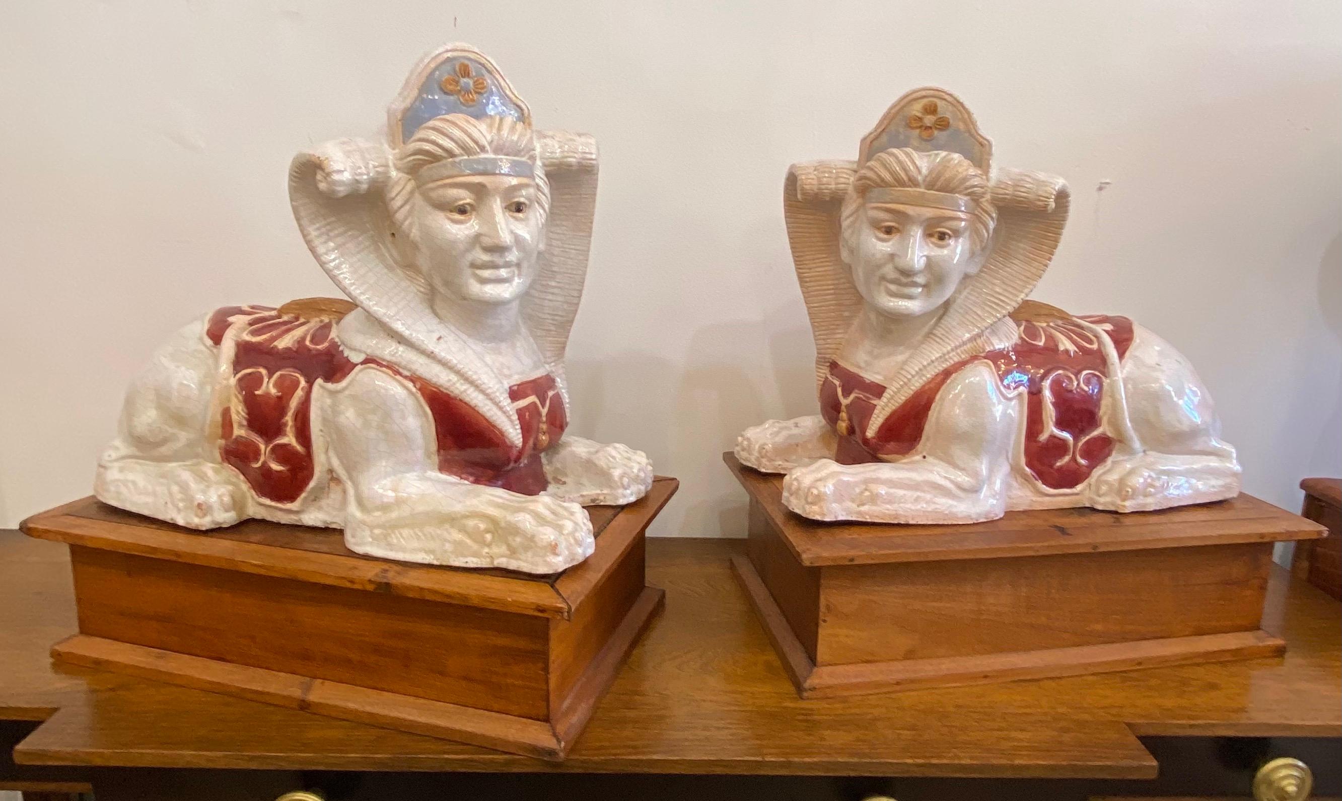 Glazed Terracotta Sphinx Sculptures a Pair In Good Condition For Sale In West Palm Beach, FL