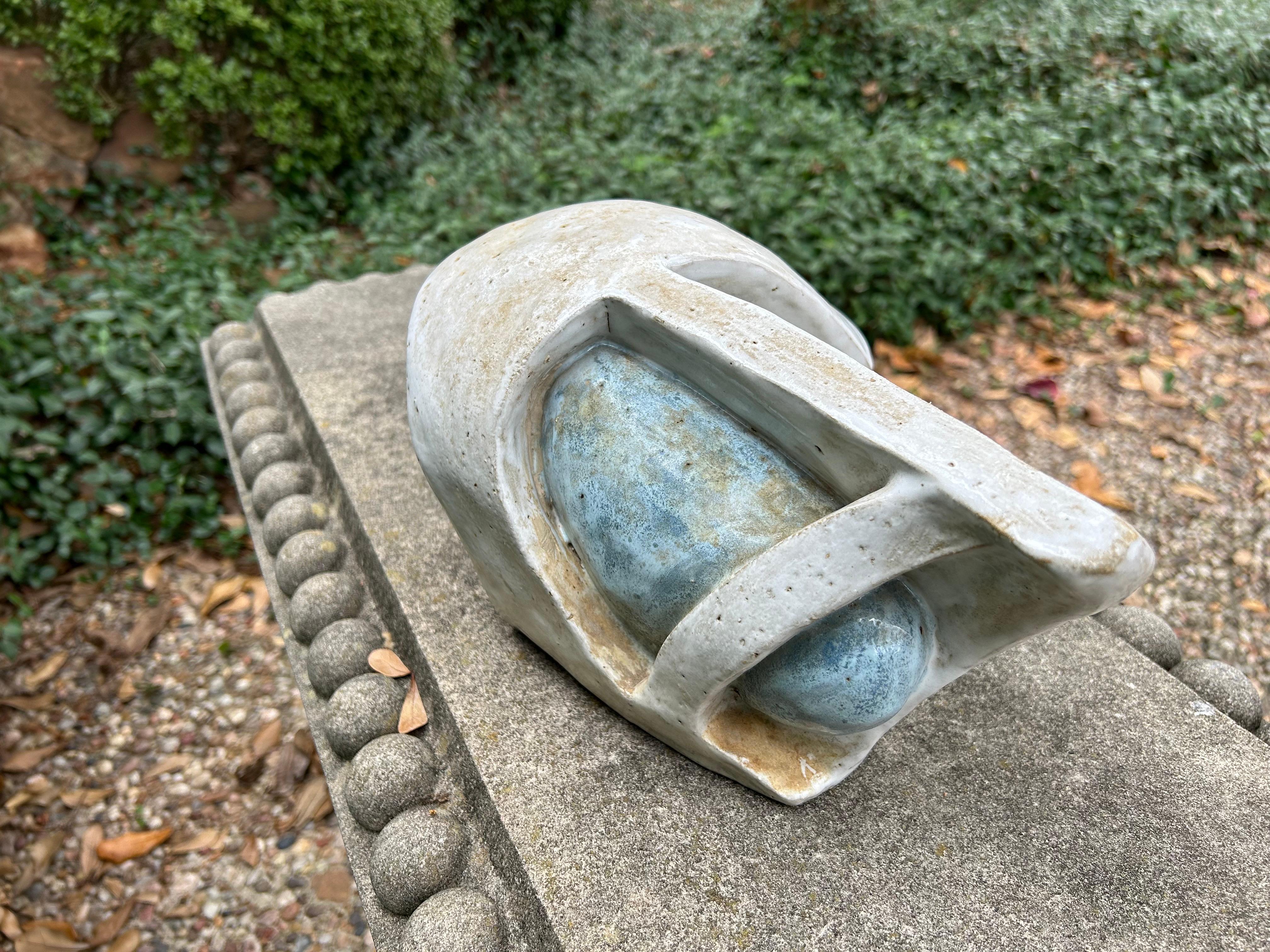 Glazed Terracotta Abstract Sculpture.
Offered is an interesting abstract sculpture of glazed terracotta in cream and blue.
This beautiful sculpture would look great as a coffee table or bookcase accessory.
Most interesting!