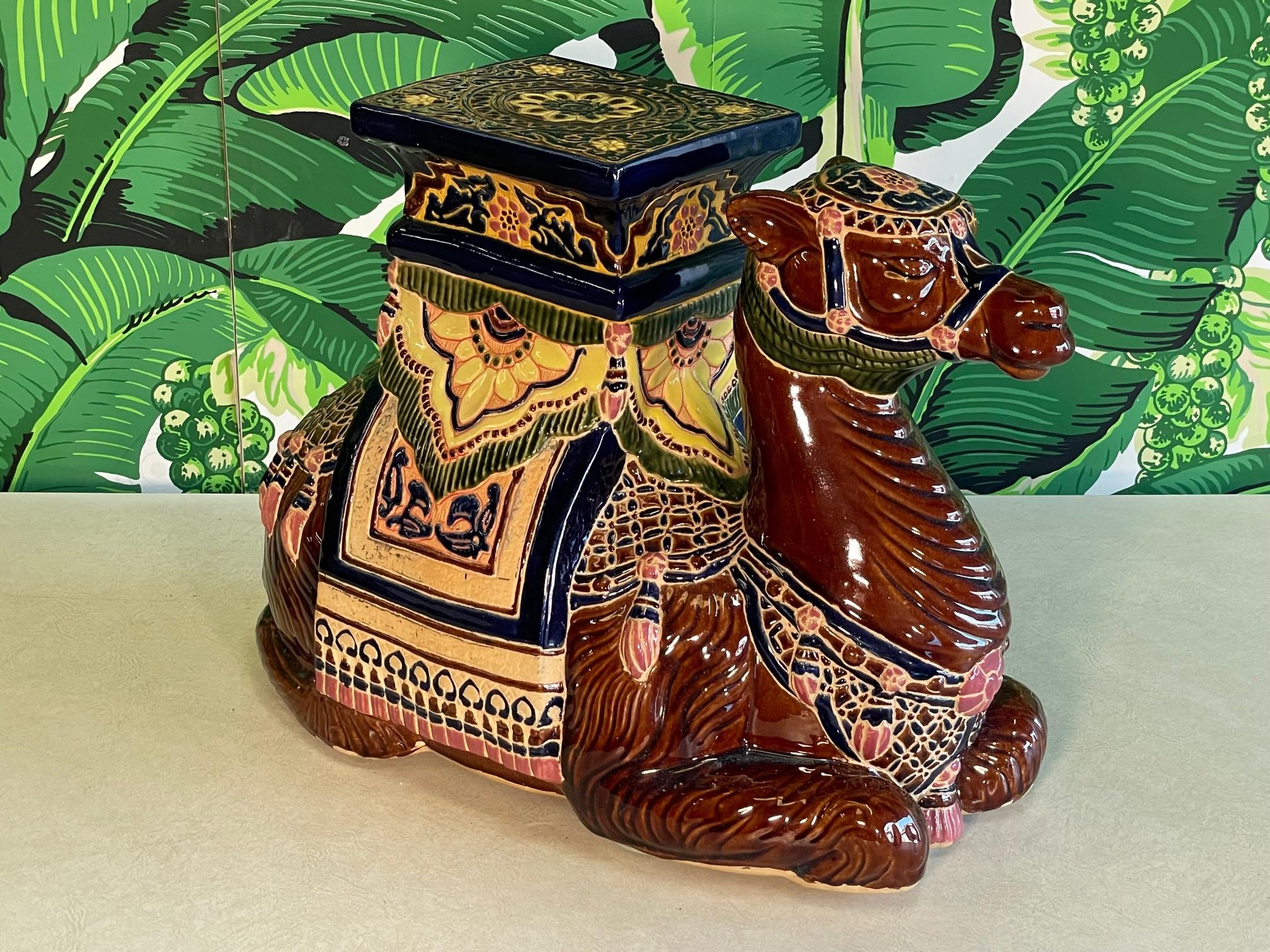 Large handcrafted glazed terracotta camel garden stool, flower pot seat or side table is sure to be a conversation piece. Good condition with imperfections consistent with age, see photos for condition details. 
For a shipping quote to your exact
