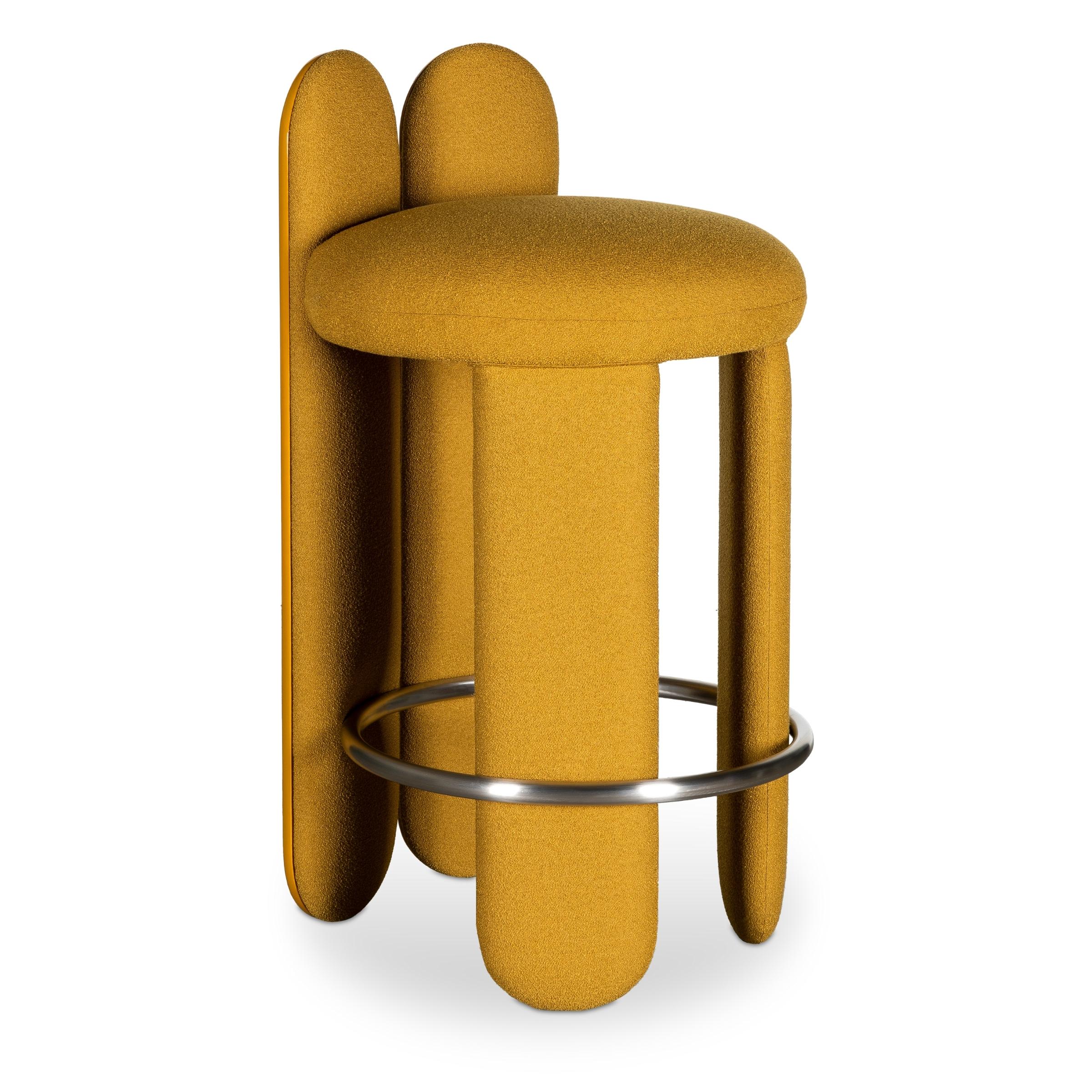 Two extended legs provide a small backrest that adds comfort to the rounded seat, while a footrest ring subtly unites the four curvaceous legs.
Glazy Counter Stool will exceed any expectations when in dialogue with further curated pieces – and, of
