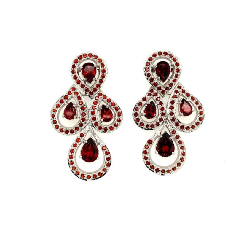 These gorgeous Gleaming Garnet Chandelier Earrings are crafted from the finest material and adorned with dazzling garnet gemstone which is believed to bring good luck and love in relationship.
These chandelier earrings are perfect accessory to