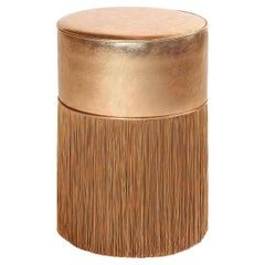 Pouf in pelle metallizzata oro rosa con frange in lurex di Lorenza Bozzoli