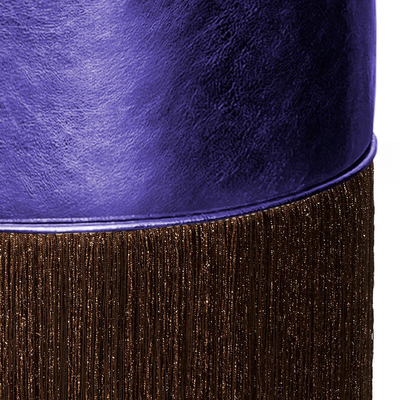 The Gleaming collection by Lorenza Bozzoli Couture shines in its own light and captures attention with its lustrous allure. The seatings of the signature fringed poufs have been enveloped into foil-finished leather glossy and radiant, carefully