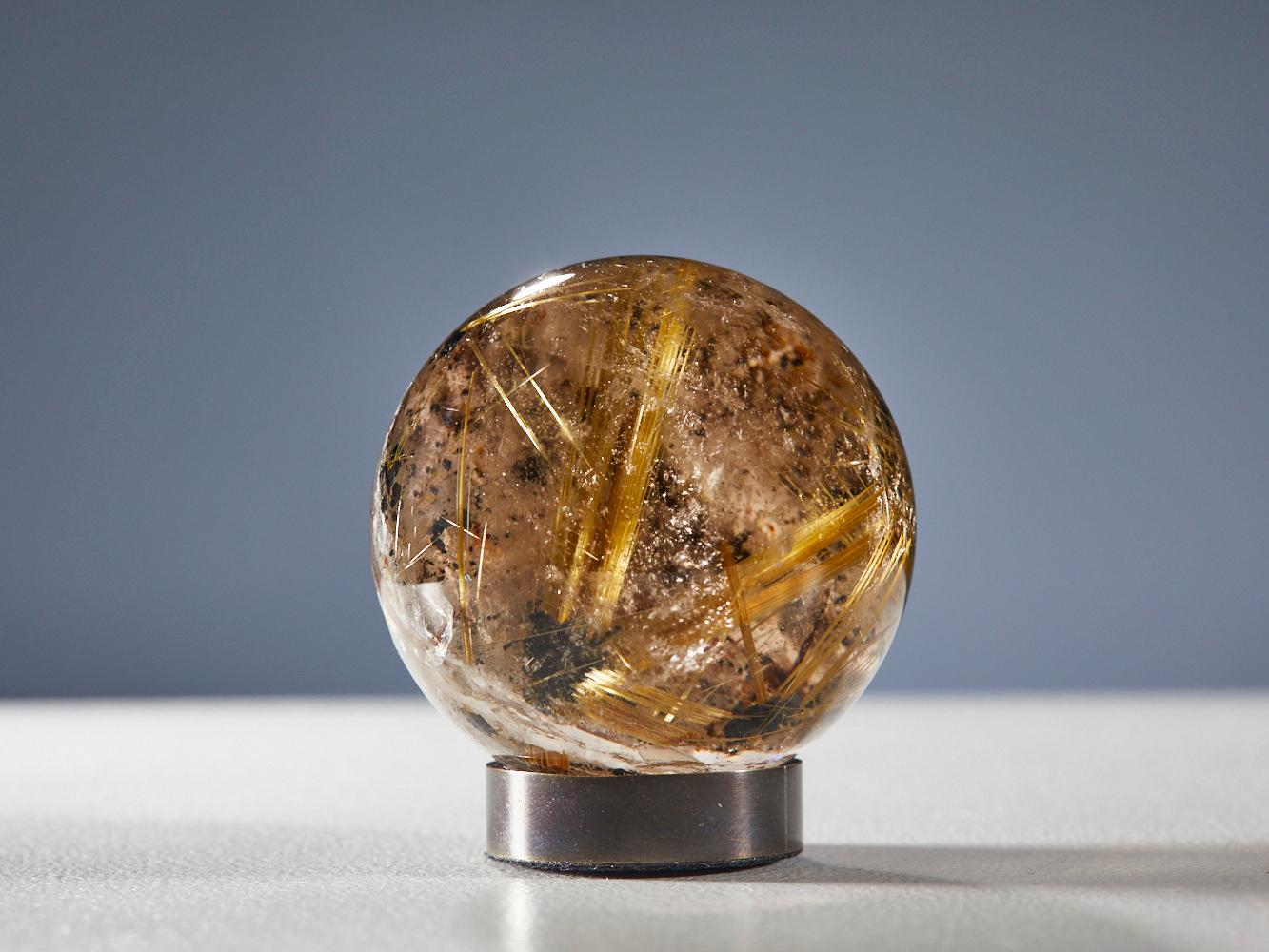 Brazilian Gleaming Quartz Sphere with Golden Rutile For Sale