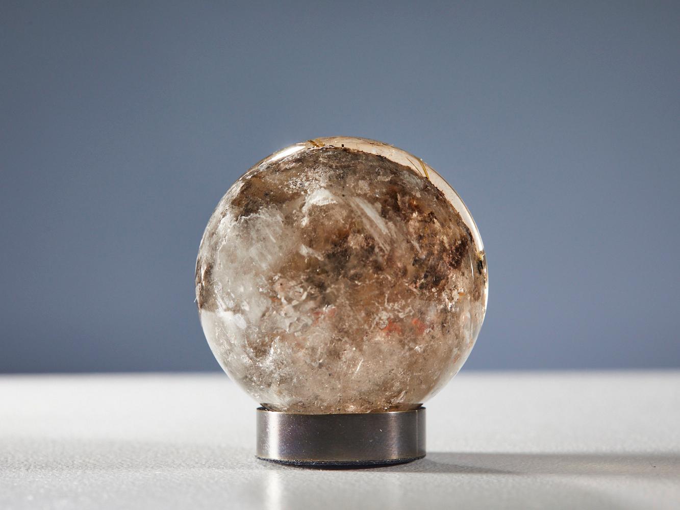 Bronze Gleaming Quartz Sphere with Golden Rutile For Sale