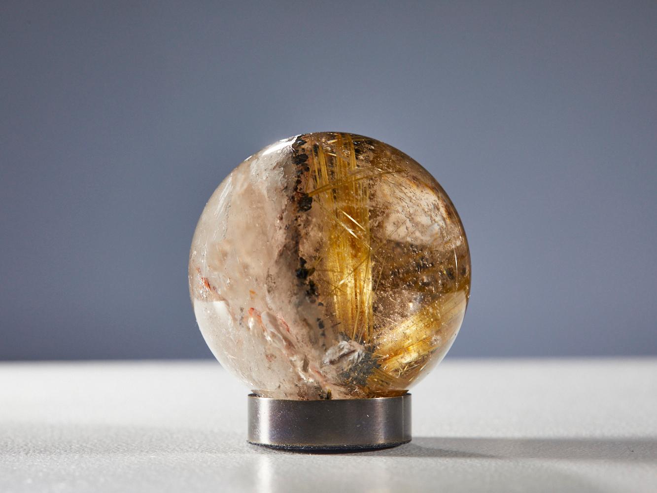 Gleaming Quartz Sphere with Golden Rutile For Sale 1