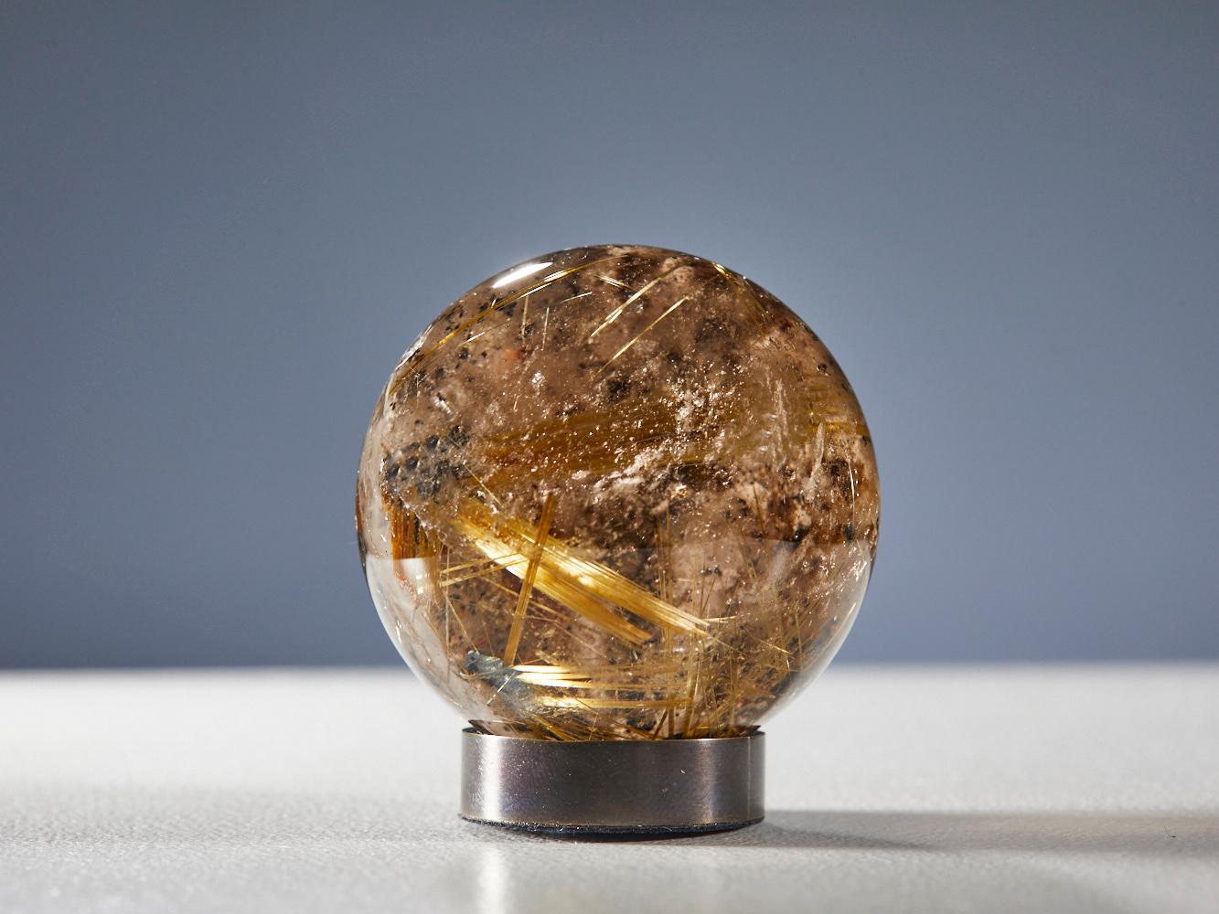 Gleaming Quartz Sphere with Golden Rutile For Sale 2