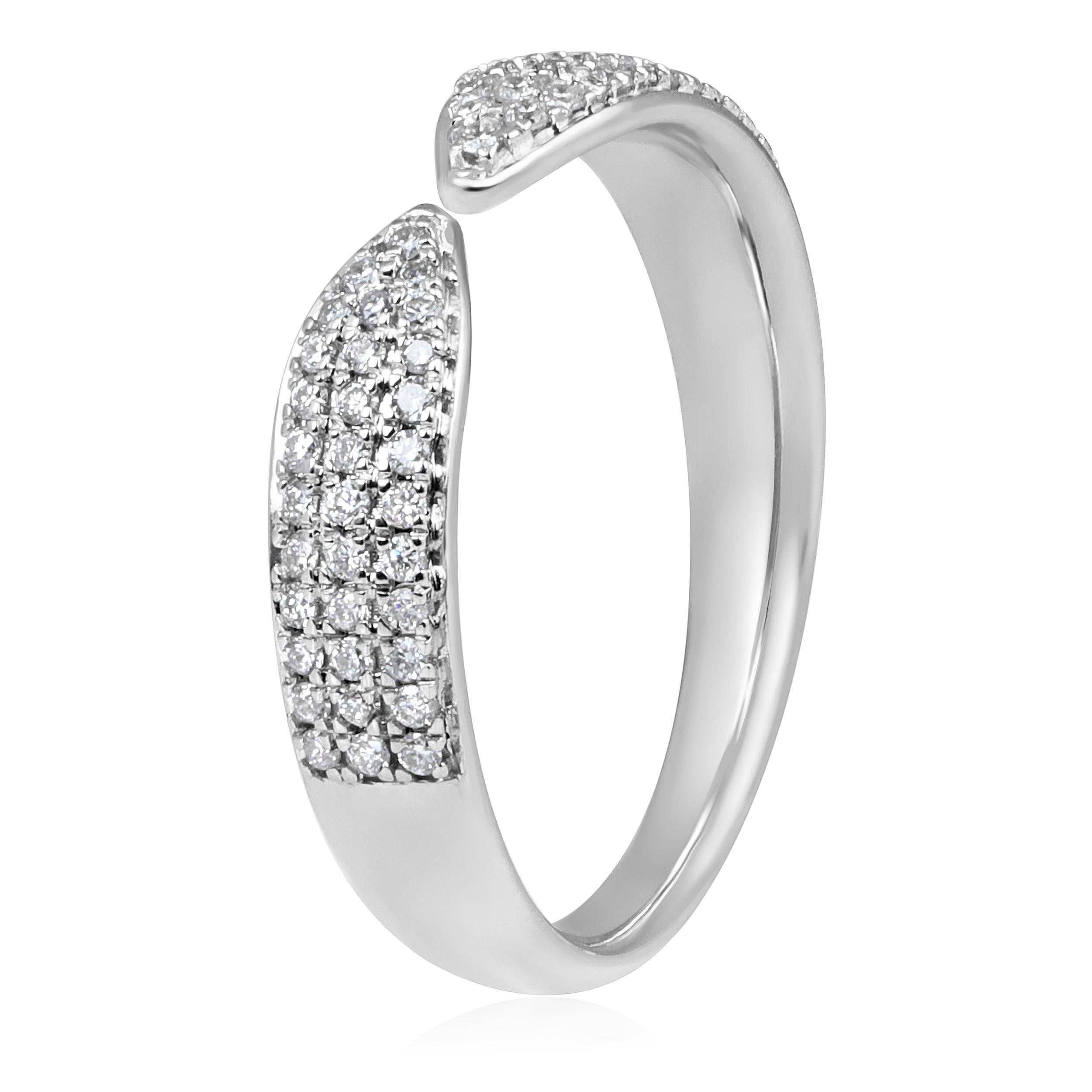 Crafted in 2.78 grams of 14K White Gold, the ring contains 66 stones of Round Natural Diamonds with a total of 0.25 carat in E-F color and SI clarity.

CONTEMPORARY AND TIMELESS ESSENCE: Crafted in 14-karat/18-karat with 100% natural diamond and
