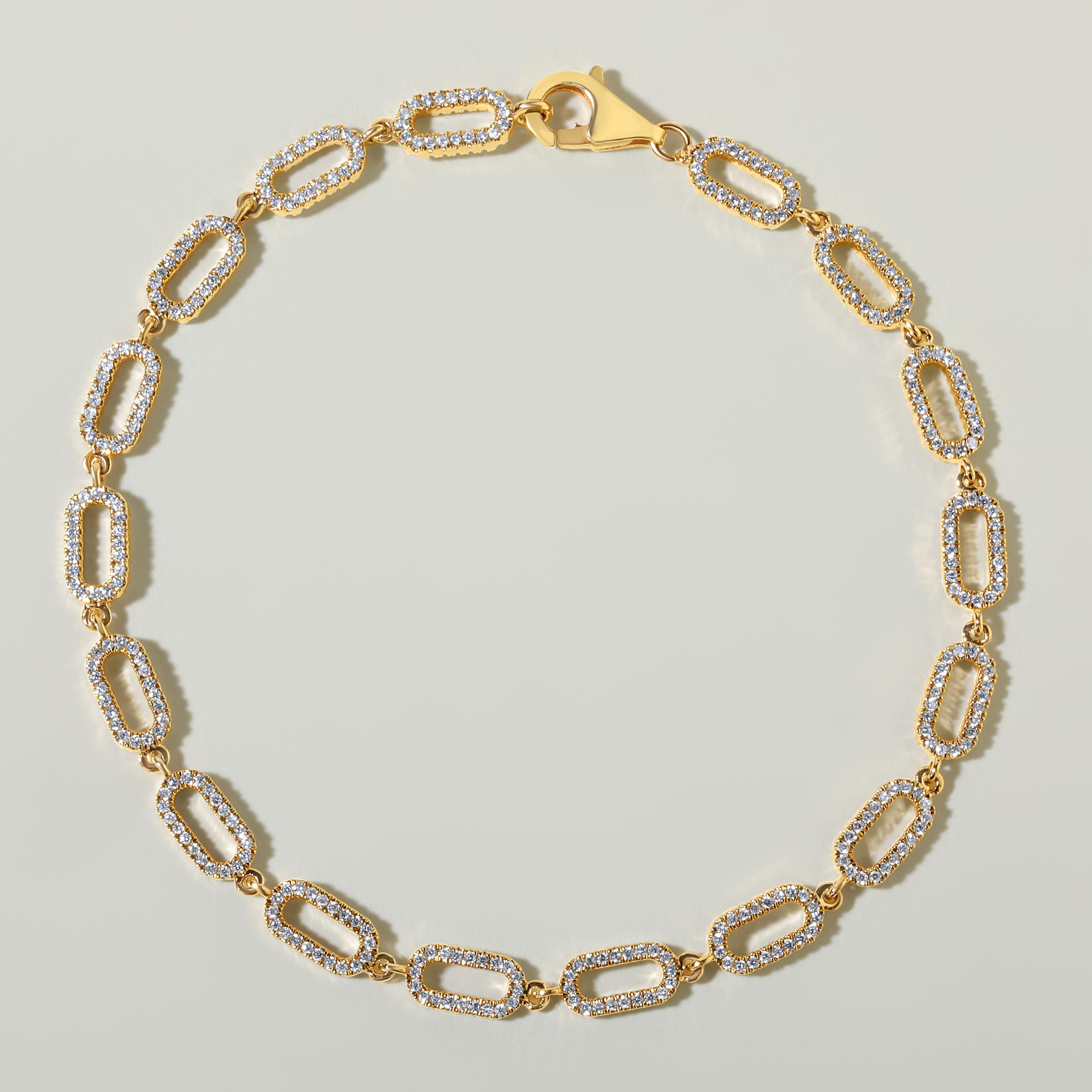 Crafted in 4.1 grams of 14K Yellow Gold, the bracelet contains 340 stones of Round Natural Diamonds with a total of 0.79 carat in E-F color and SI clarity. The bracelet length is 7 inches.
CONTEMPORARY AND TIMELESS ESSENCE: Crafted in