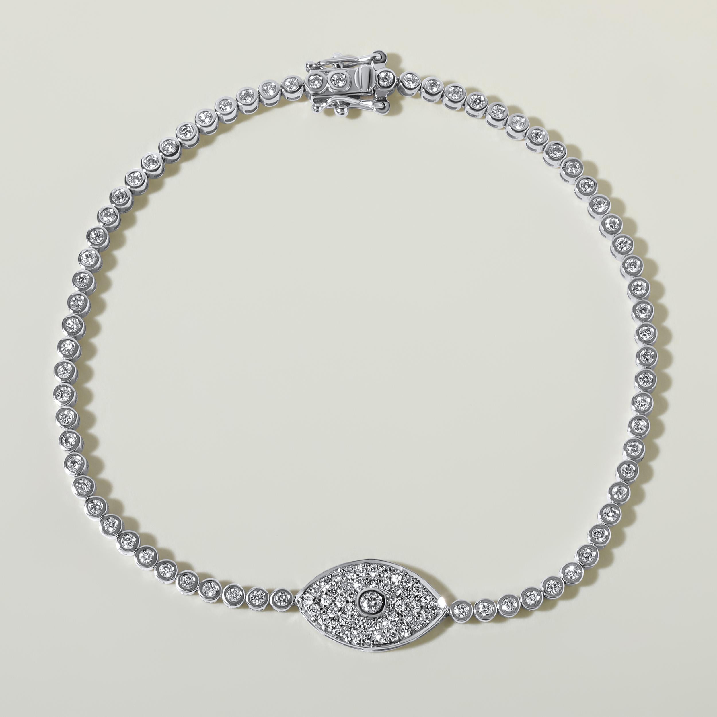 Crafted in 5.73 grams of 14K White Gold, the bracelet contains 116 stones of Round Natural Diamonds with a total of 0.97 carat in F-G color and SI clarity. The bracelet length is 7 inches.

CONTEMPORARY AND TIMELESS ESSENCE: Crafted in