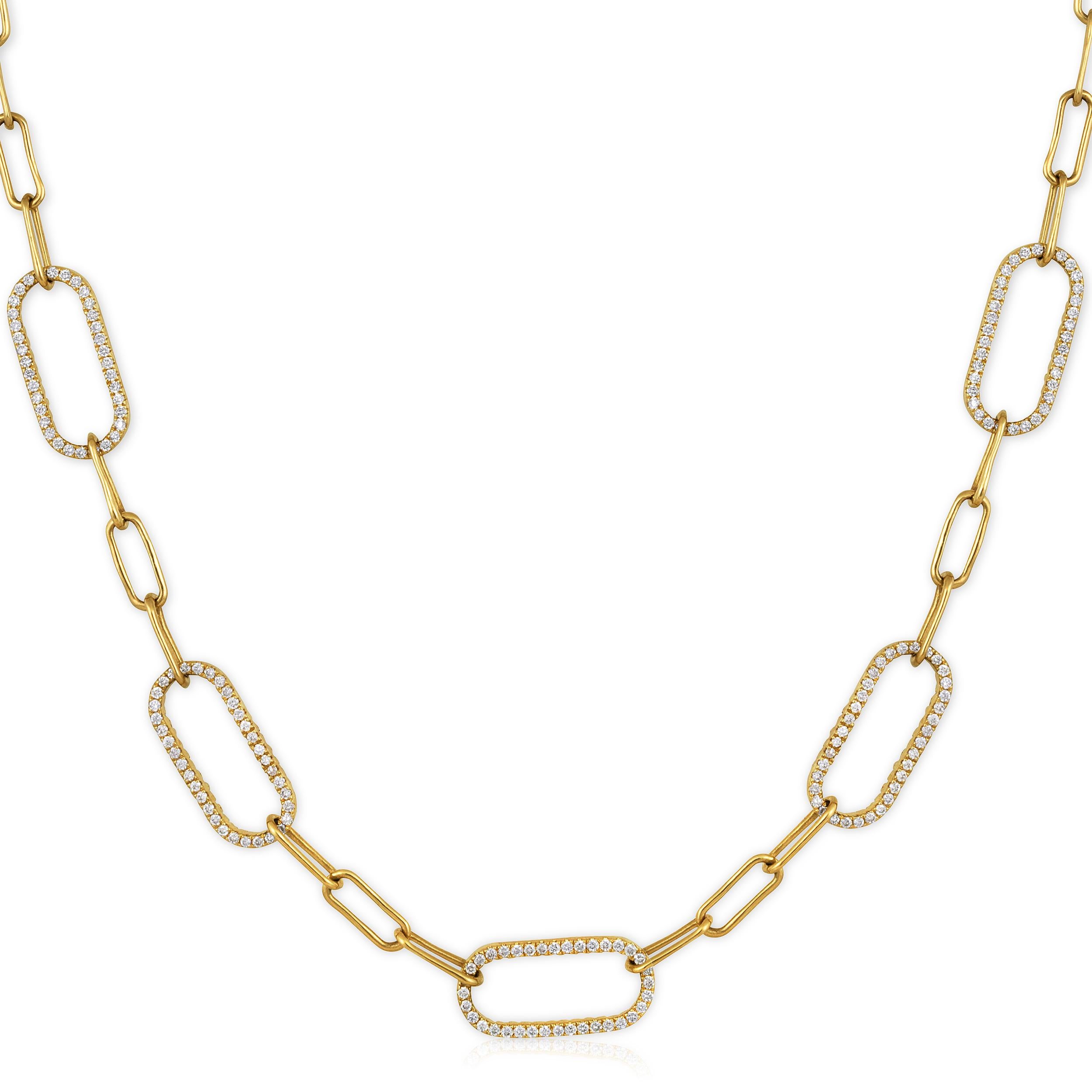 Crafted in 6.01 grams of 14K Yellow Gold, the necklace contains 360 stones of Round Natural Diamonds with a total of 1.05 carat in F-G color and SI clarity. The necklace length is 18 inches.

CONTEMPORARY AND TIMELESS ESSENCE: Crafted in