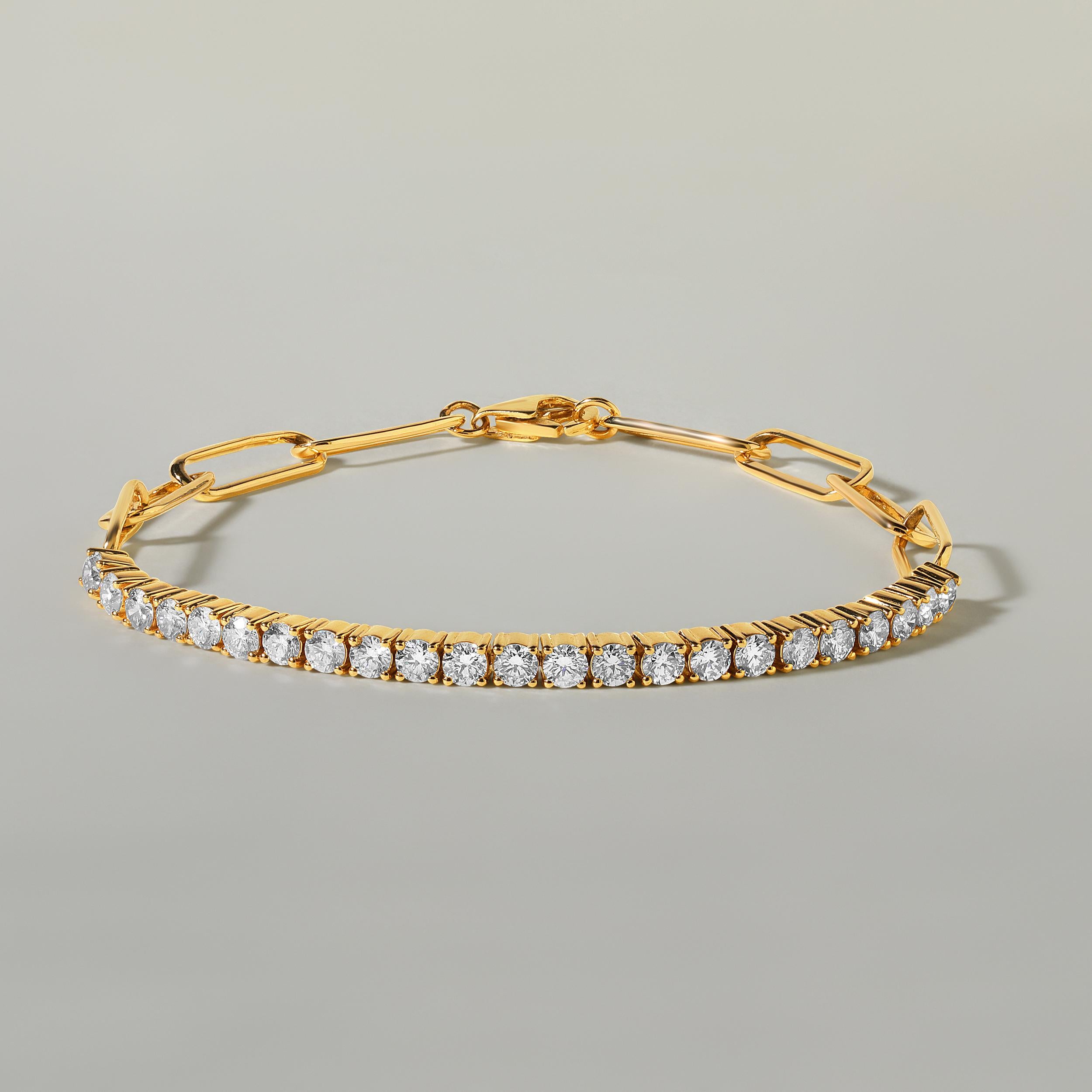 Fabriqué en or jaune 14 carats de 6,93 grammes, le bracelet contient 23 pierres de diamants ronds naturels d'un total de 2,03 carats de couleur G-H et de pureté SI. La longueur du bracelet est de 7 pouces.
Ce bijou sera confectionné par nos artisans