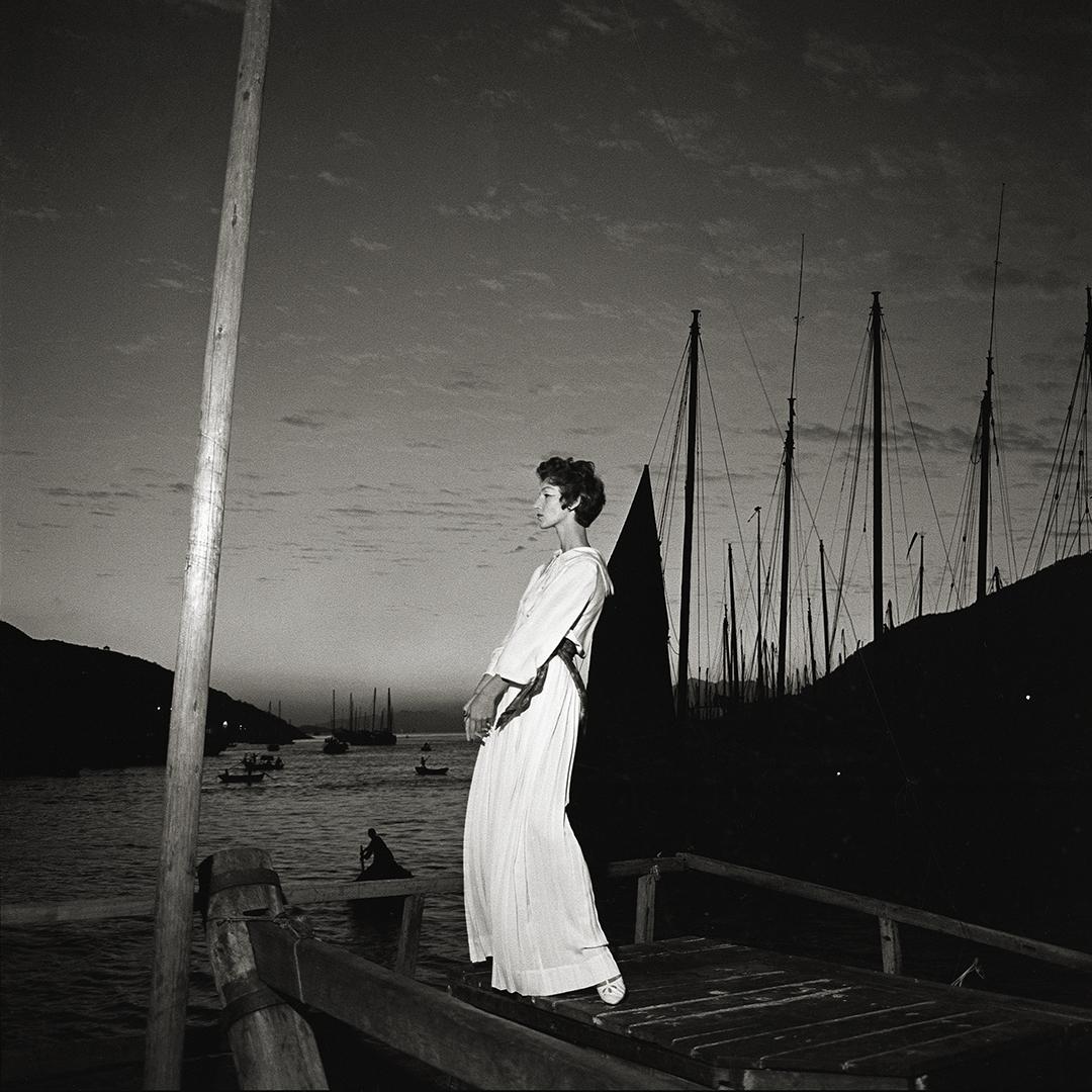 Selected from Derujinsky: The Around The World Portfolio, shot in Kowloon, Hong Kong for Harper's Bazaar

Artist: Gleb Derujinsky

Title: Kowloon

Year: 1957

Estate Edition: signed, stamped and numbered on verso. Signed by Andrea Derujinsky.
