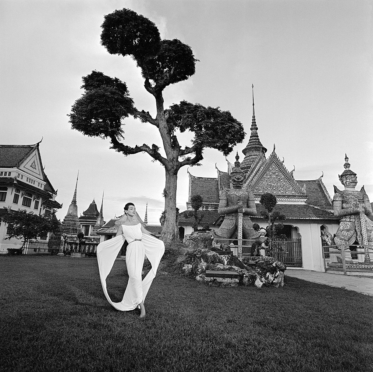 Selected from the Derujinsky: Around The World Portfolio, shot at the Grand Palace in Thailand for Harper's Bazaar

Artist: Gleb Derujinsky

Title: Fragrant Harbor

Year: 1957

Estate Edition: signed, stamped and numbered on verso. Signed by Andrea