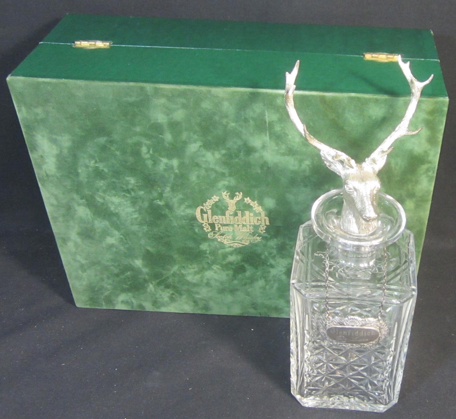 Glenfiddich Edinburgh crystal whisky decanter in presentation box, sterling silver label hallmarked 1980.
Measurements are for the case.