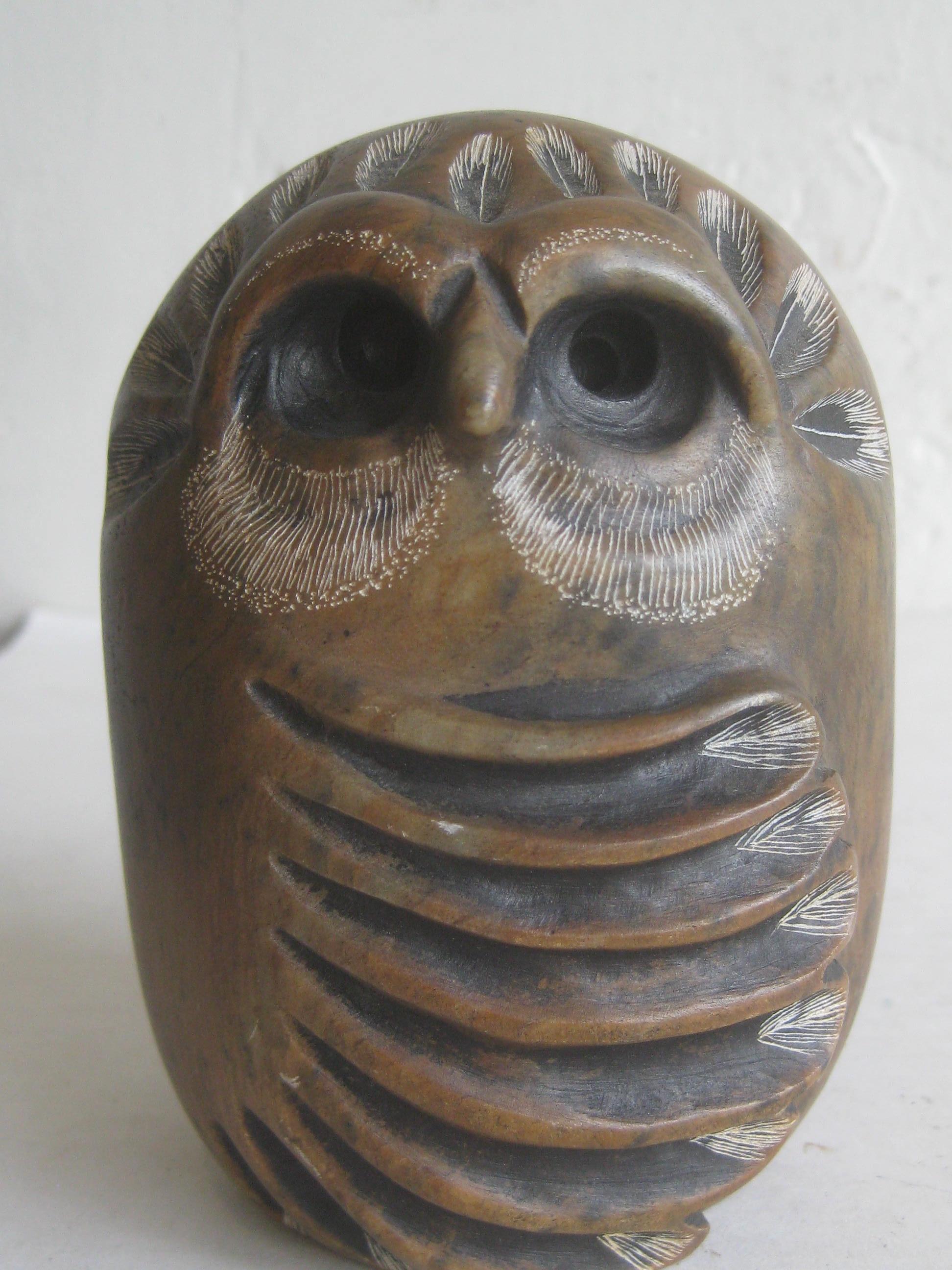 Great hand carved soapstone sculpture carving of an owl by California listed artist Glenn Heath. Dated from 1984 and is hand signed on the bottom. Has awesome details and color. In excellent shape. Measures approx. 4 1/2