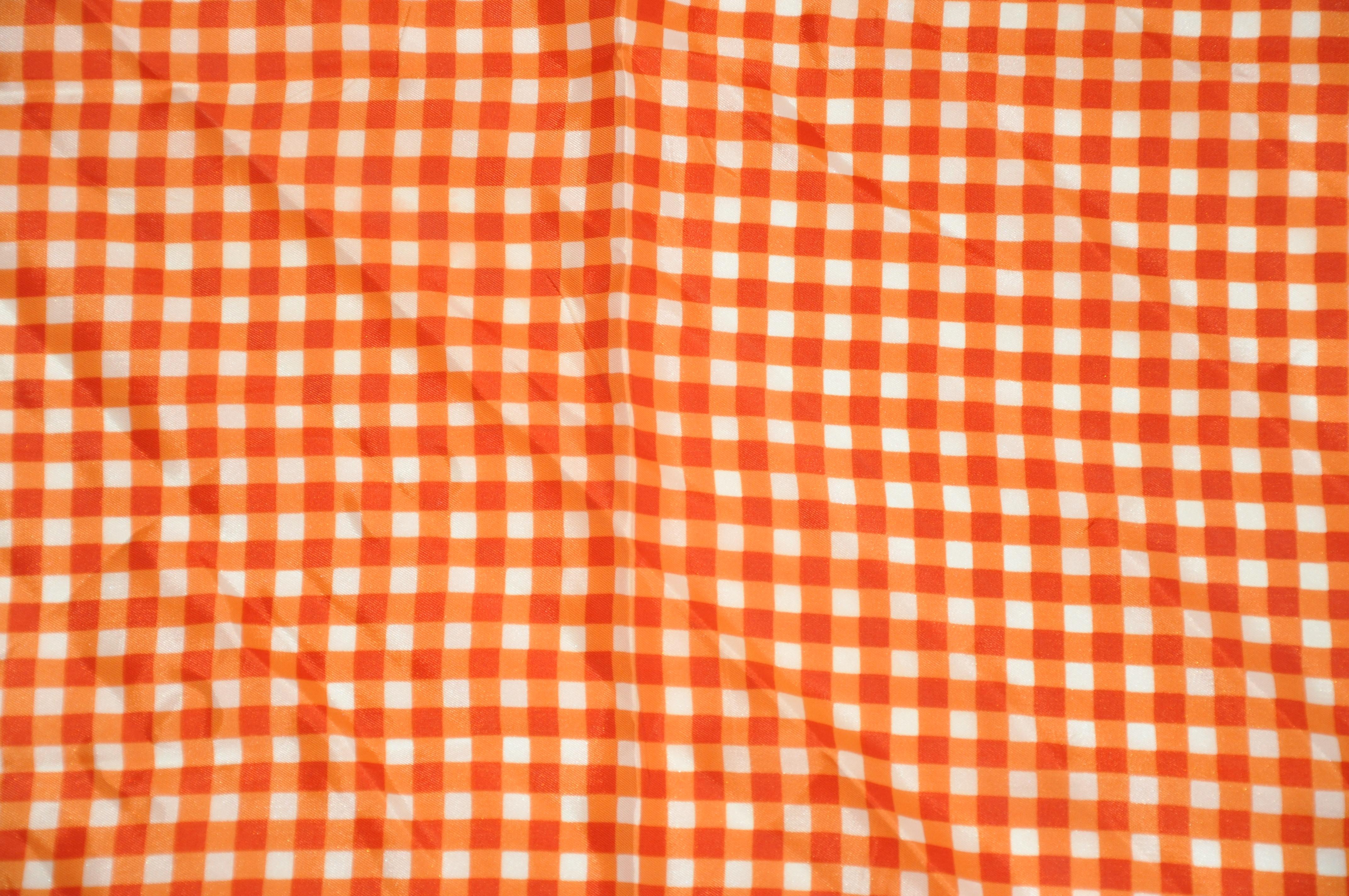      Glentex wonderful multi-stripe borders with red, tangerine and white checkered center scarf of acetate, measures 23inches by 23 inches. Made in Japan.