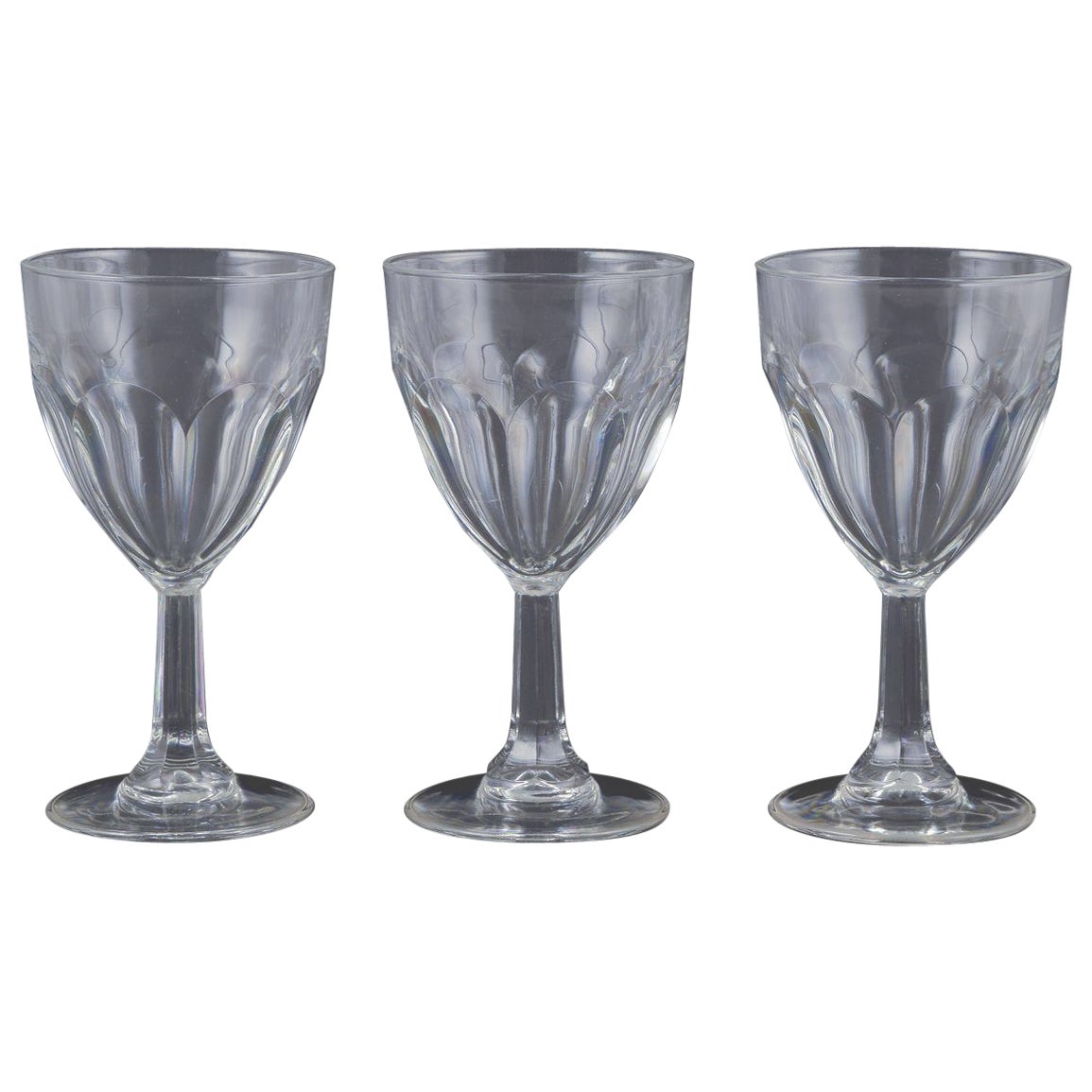 Glimma, Sweden. Three red wine glasses in crystal, faceted bowl and stem.