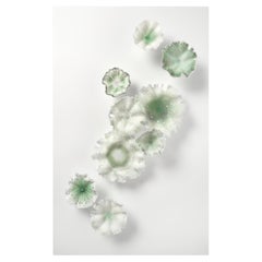 Glimmer in Green, floral green 
white glass wall installation by Verity Pulford