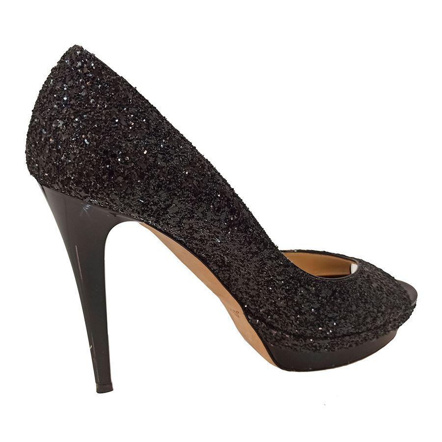 Glitter Black color Heel high cm 12 (472 inches) Plateau cm 25 (098 inches)
