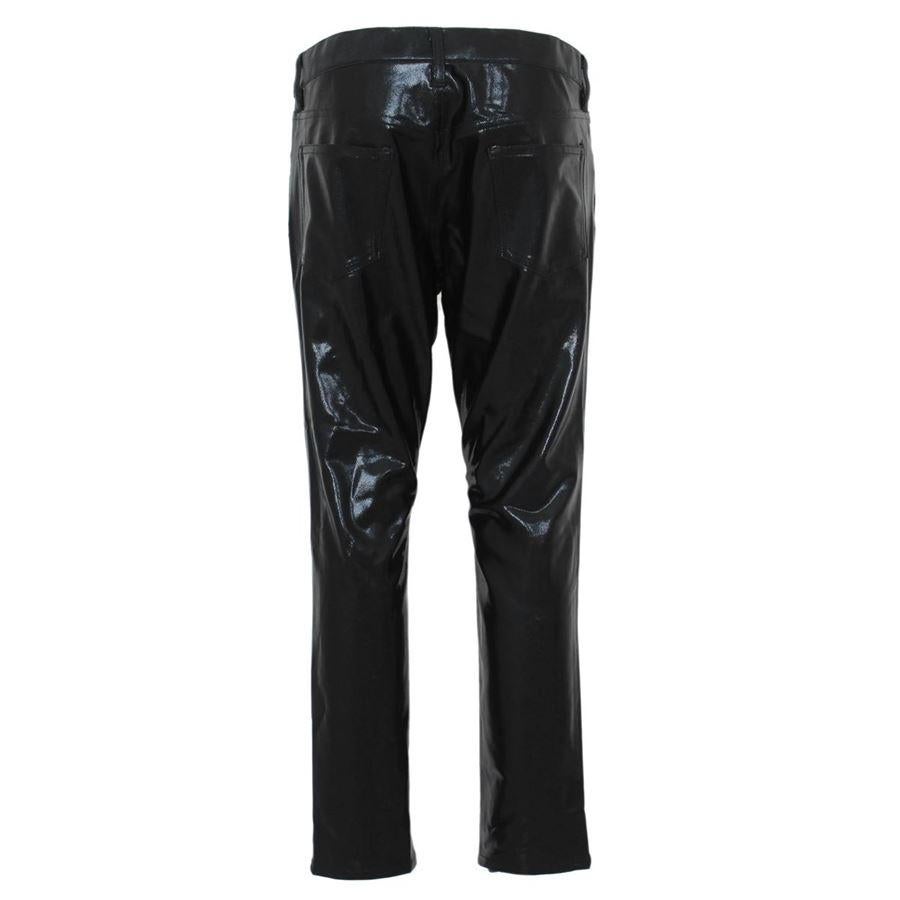 Polyester and nylon Black color Completely glittered on front Plein in the back Four pockets Length cm 85 (33.4 inches)
