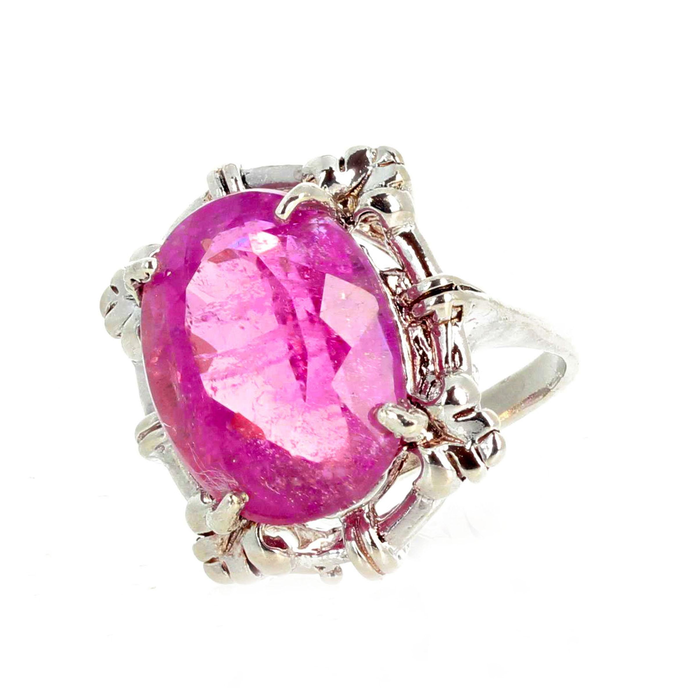 This gorgeous large natural brilliant translucent pinky purple Kunzite - 17.2mm x 13.2mm = 11.6 carats - is set in a beautiful sterling silver ring sizable 7.25.  Spectacular optical effects in the Kunzite exhibits pink reflections and fire