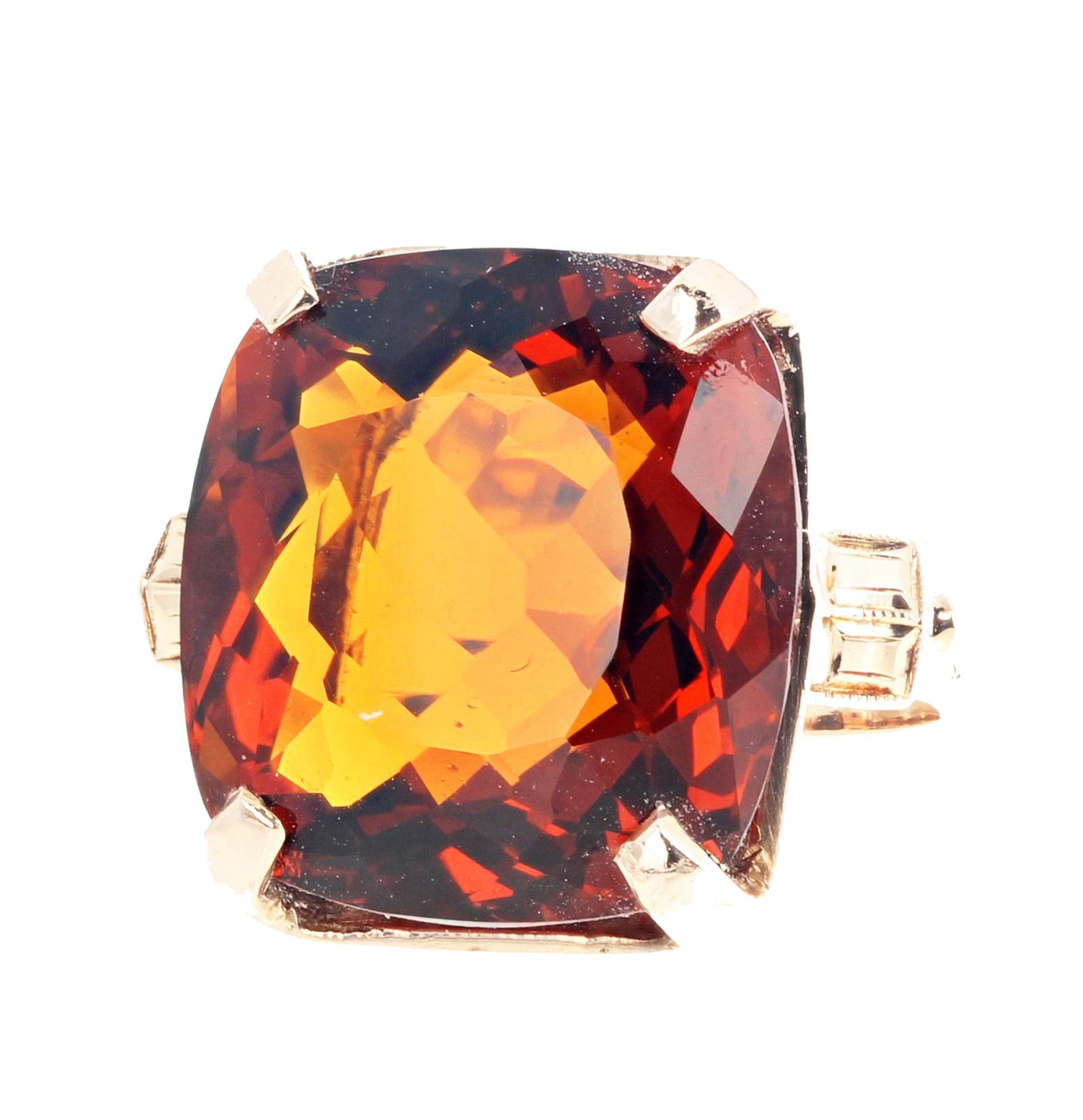 Glittering huge glorious natural cushion cut 17.45 mm x 16 mm Brazilian Citrine from the famous mine in Rio Grande do Sul in Brazil enhanced with tiny little white Diamonds set in a 14 Kt yellow gold ring size 6 sizable.  This magnificent gemstone