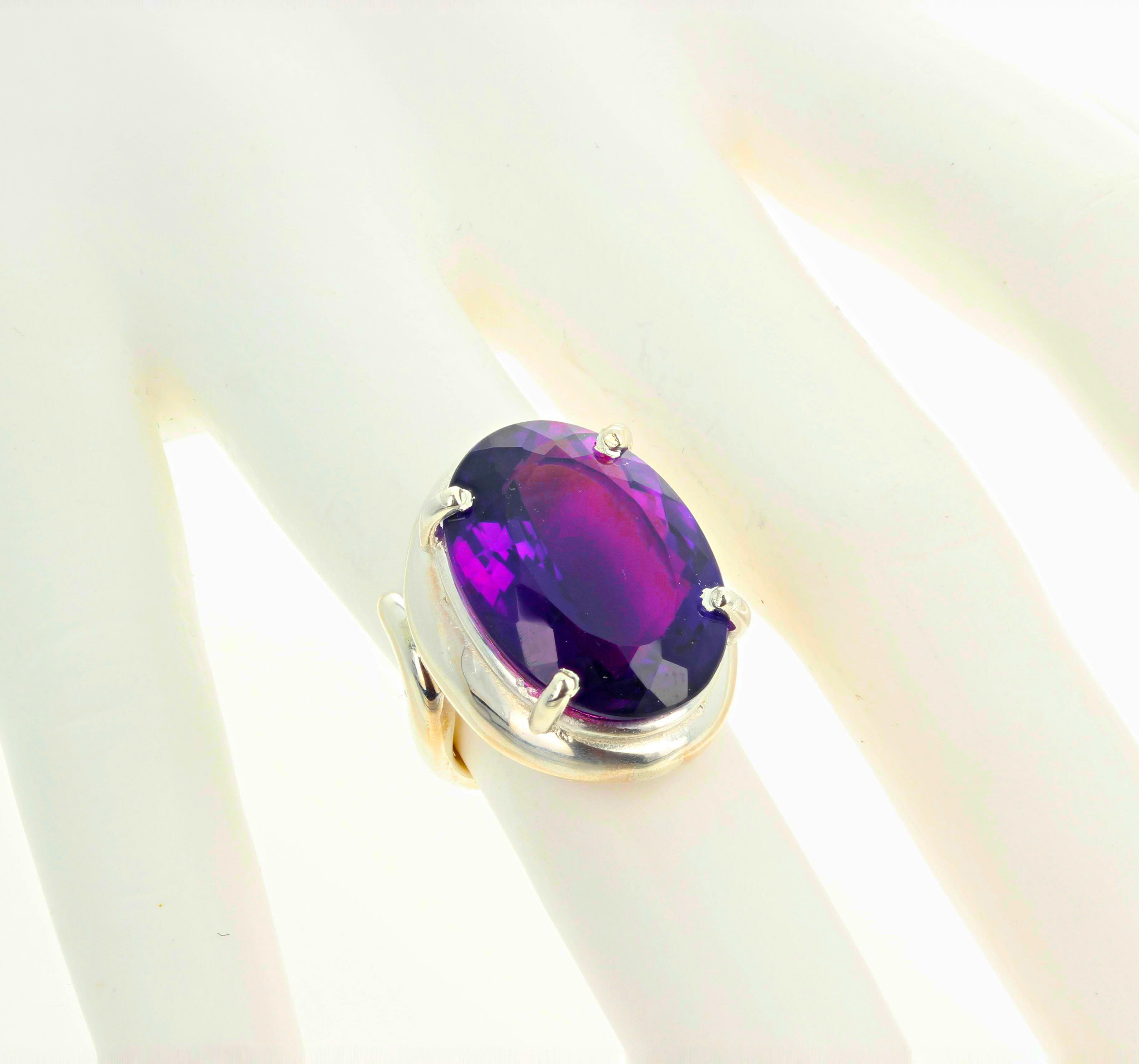 This beautiful 16.15 carat Amethyst - 20 mm x 15 mm - sits up royally in this lovely unique sterling silver ring size 6 (sizable for free). This is huge a absolutely gorgeous.