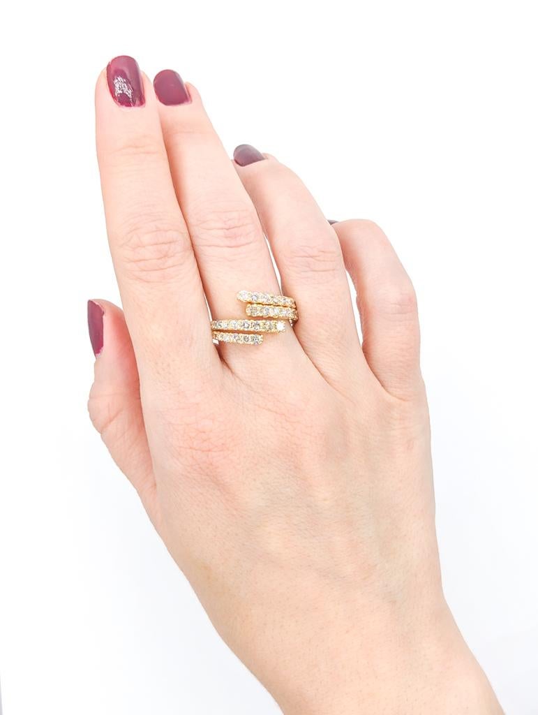Contemporary Glittering Diamond Bypass Ring in Gold For Sale