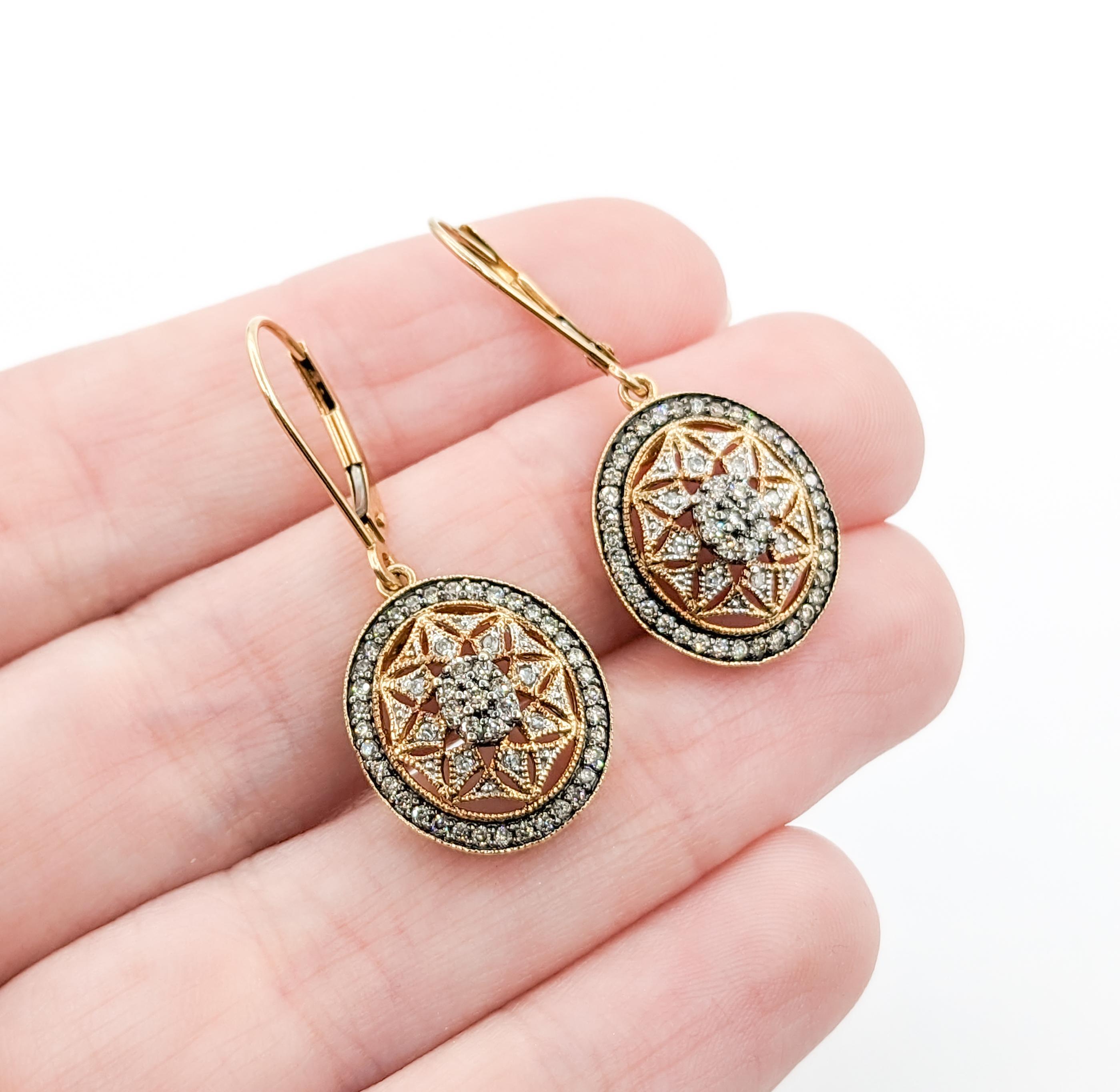 Glittering Diamond Star Drop earrings in 10K Gold

Introducing these exquisite diamond earrings, meticulously crafted from lustrous 10-karat yellow gold. Adorned with a dazzling ensemble of round diamonds totaling 0.50 carats, these sparkling gems