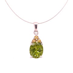 Gemjunky Glittering, Green Oval Peridot Pendant with Yellow Sapphire Accents 