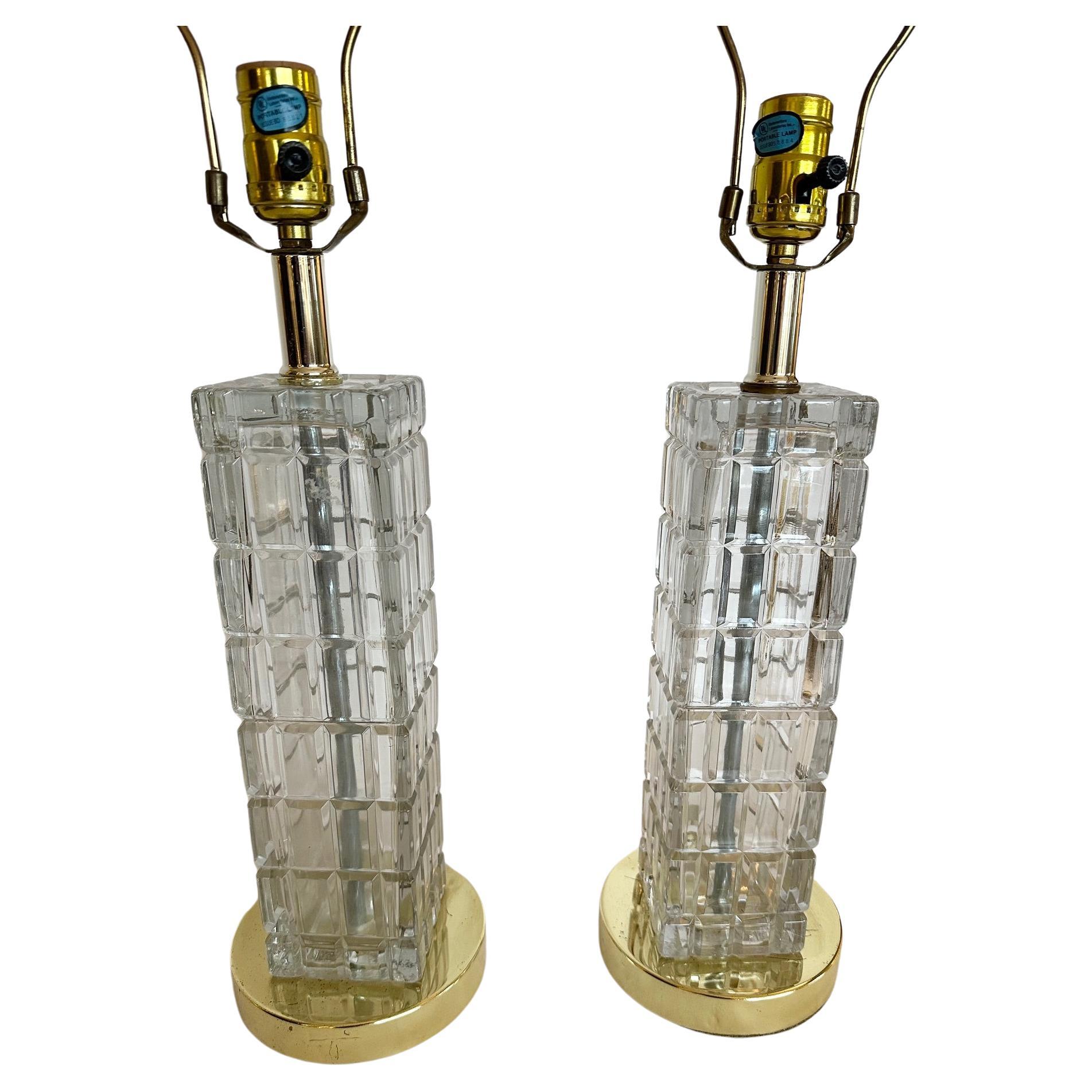 Chic pair of vintage Hollywood Regency block cube crystal table lamps on brass bases.