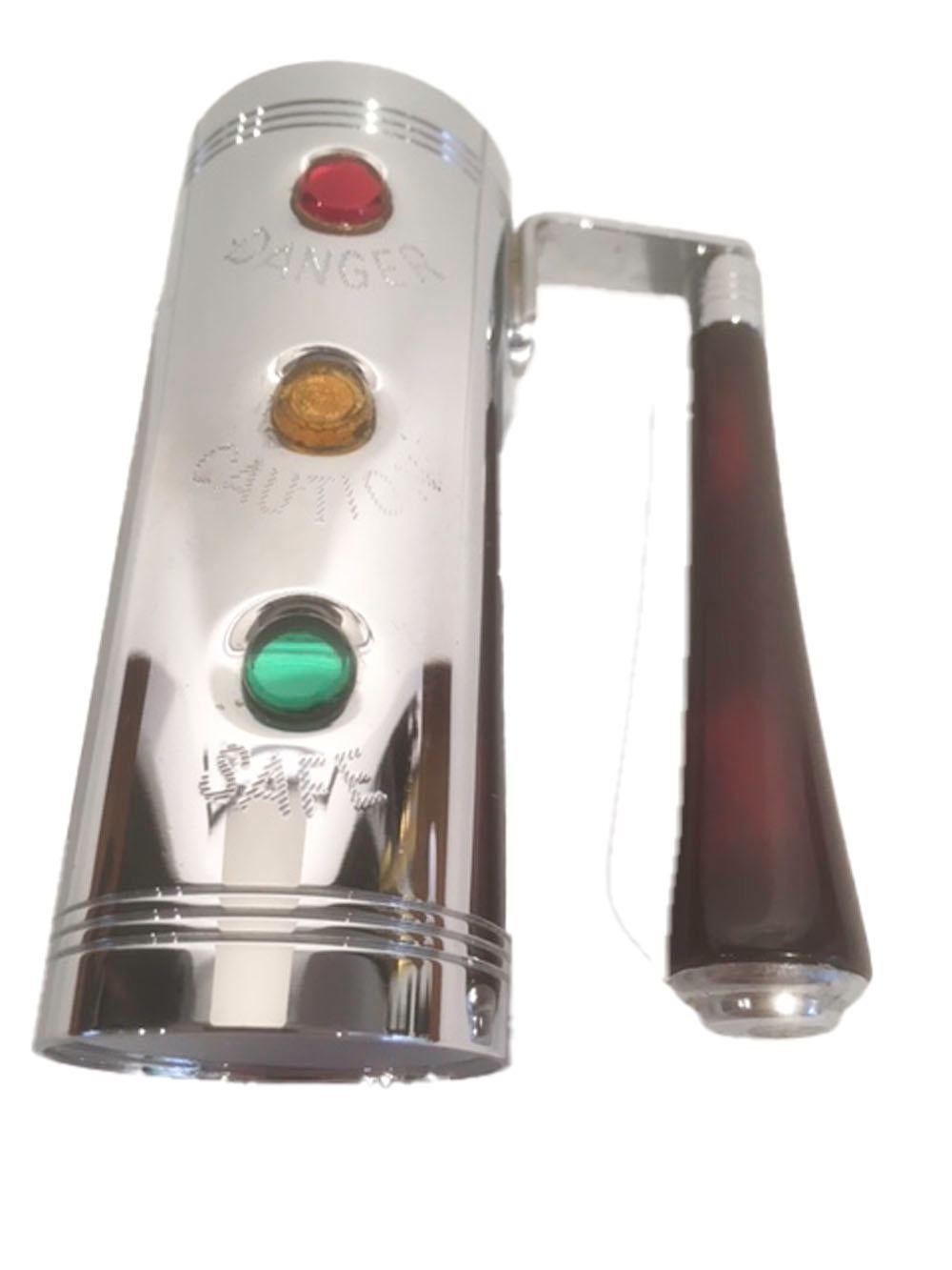 Chrome bar jigger by Glo-Hill in the form of a traffic light with a cherry red Bakelite handle. The front with red, yellow and green 