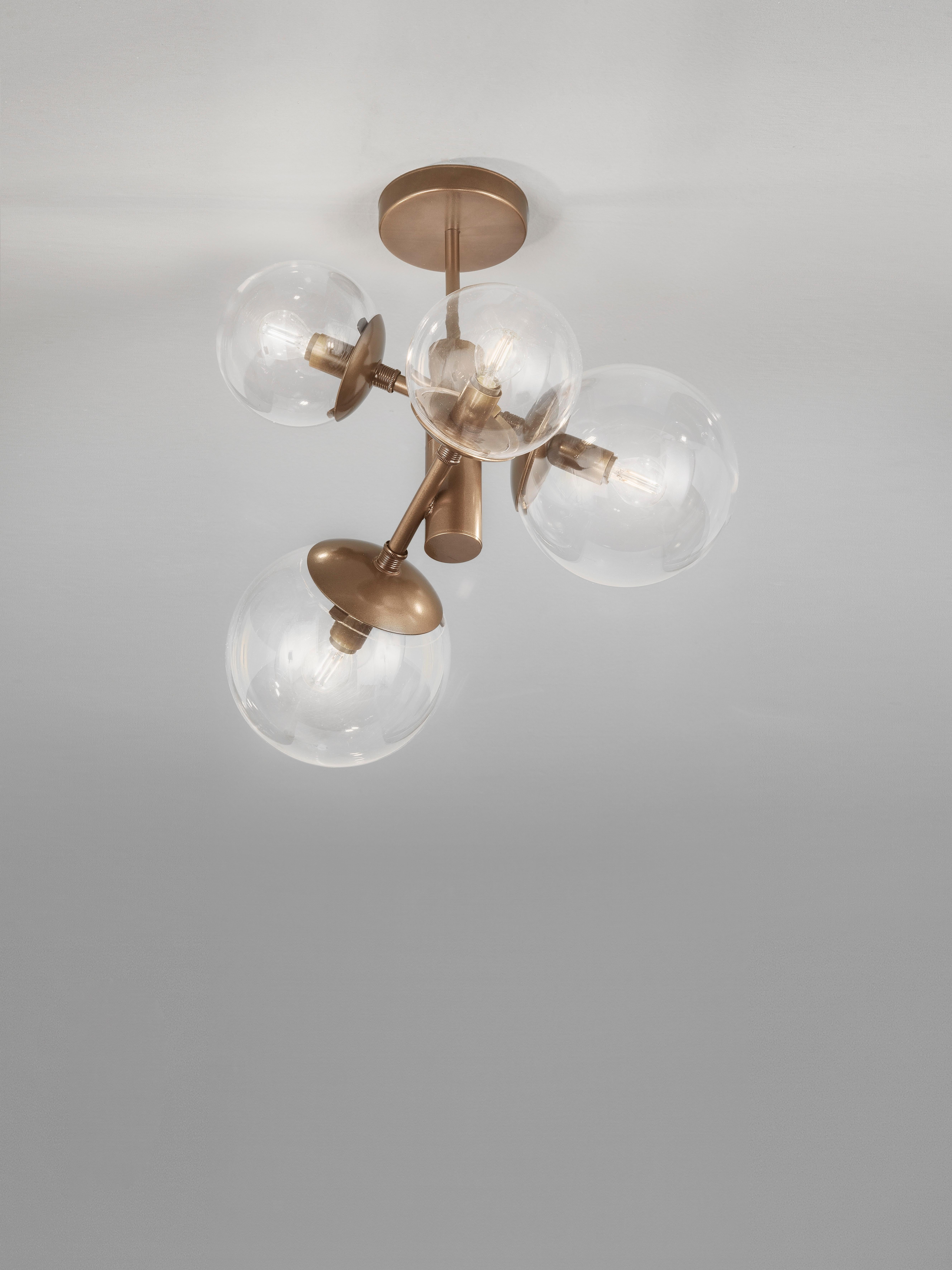 Global is the newest collection designed by Studio Tecnico Metallux. The collection comes as a result of several large-scale custom installations and strong Mid-Century influences. Global's design is featured around its clear acrylic globes. The