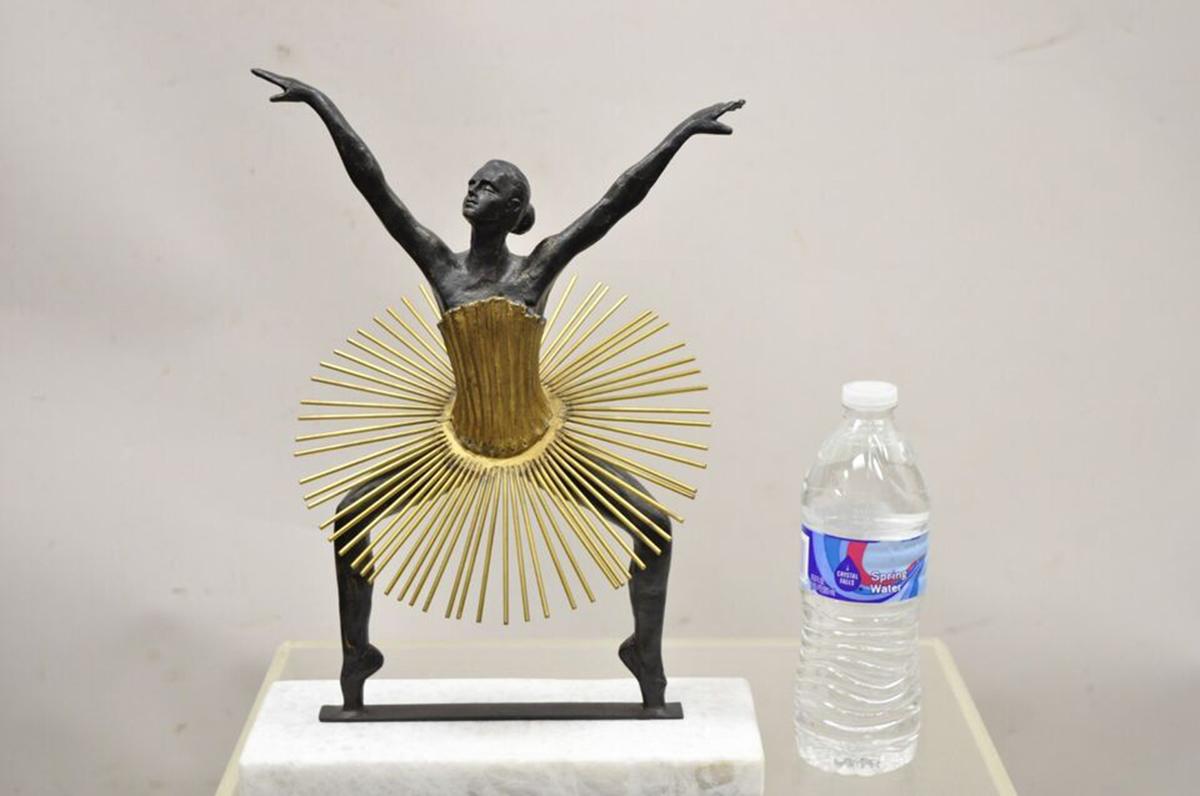 Global Views Bauhaus Grande Plié Bronze / Brass Ballerina Dancer Marble Base Statue Sculpture. Circa 21st Century, Pre-owned
Measurements: 14