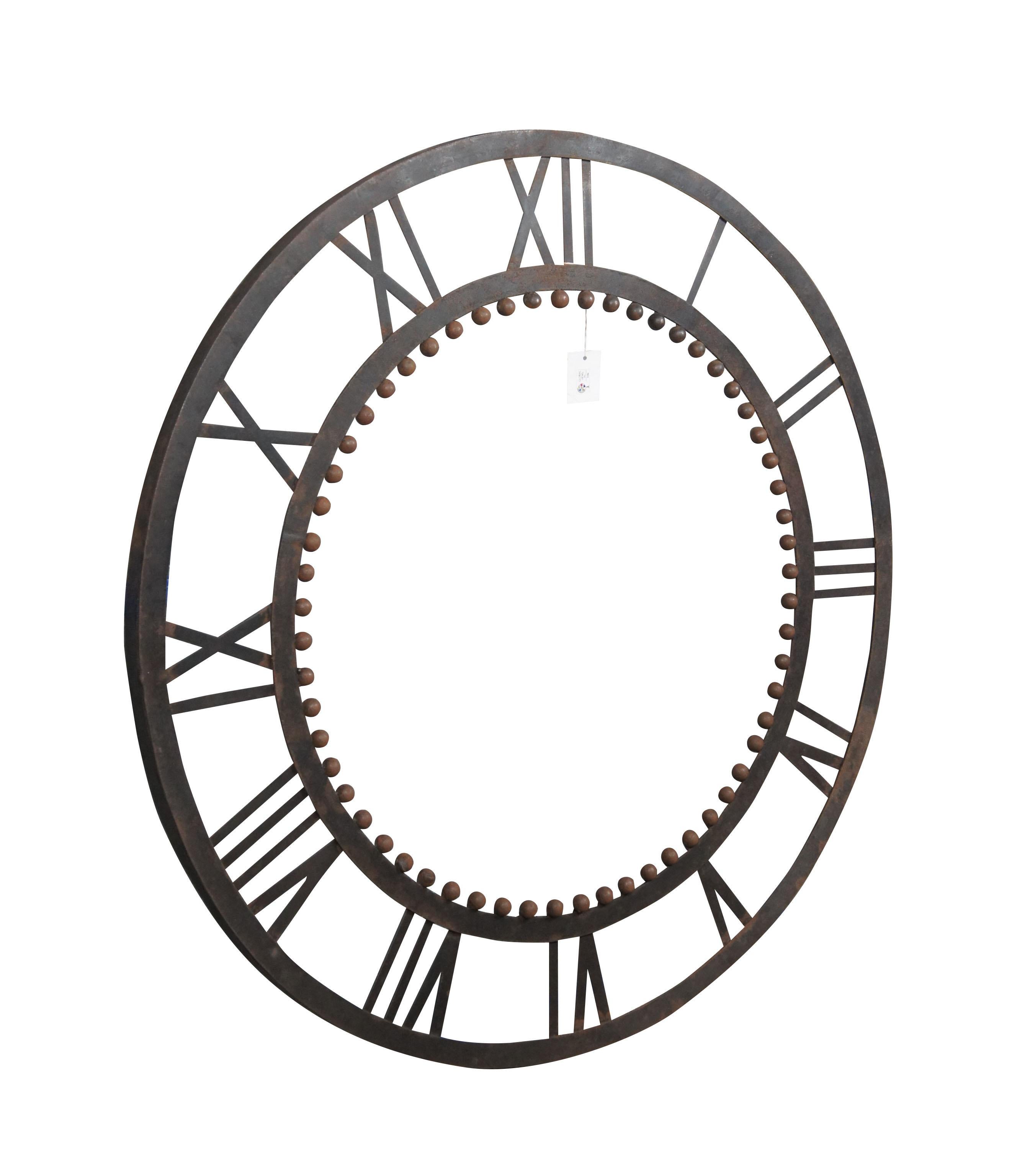 Global Views Sculptural Iron Decorative Wall Cock. Features a rustic iron finish with roman numerals and beaded interior circle. Measure: 36