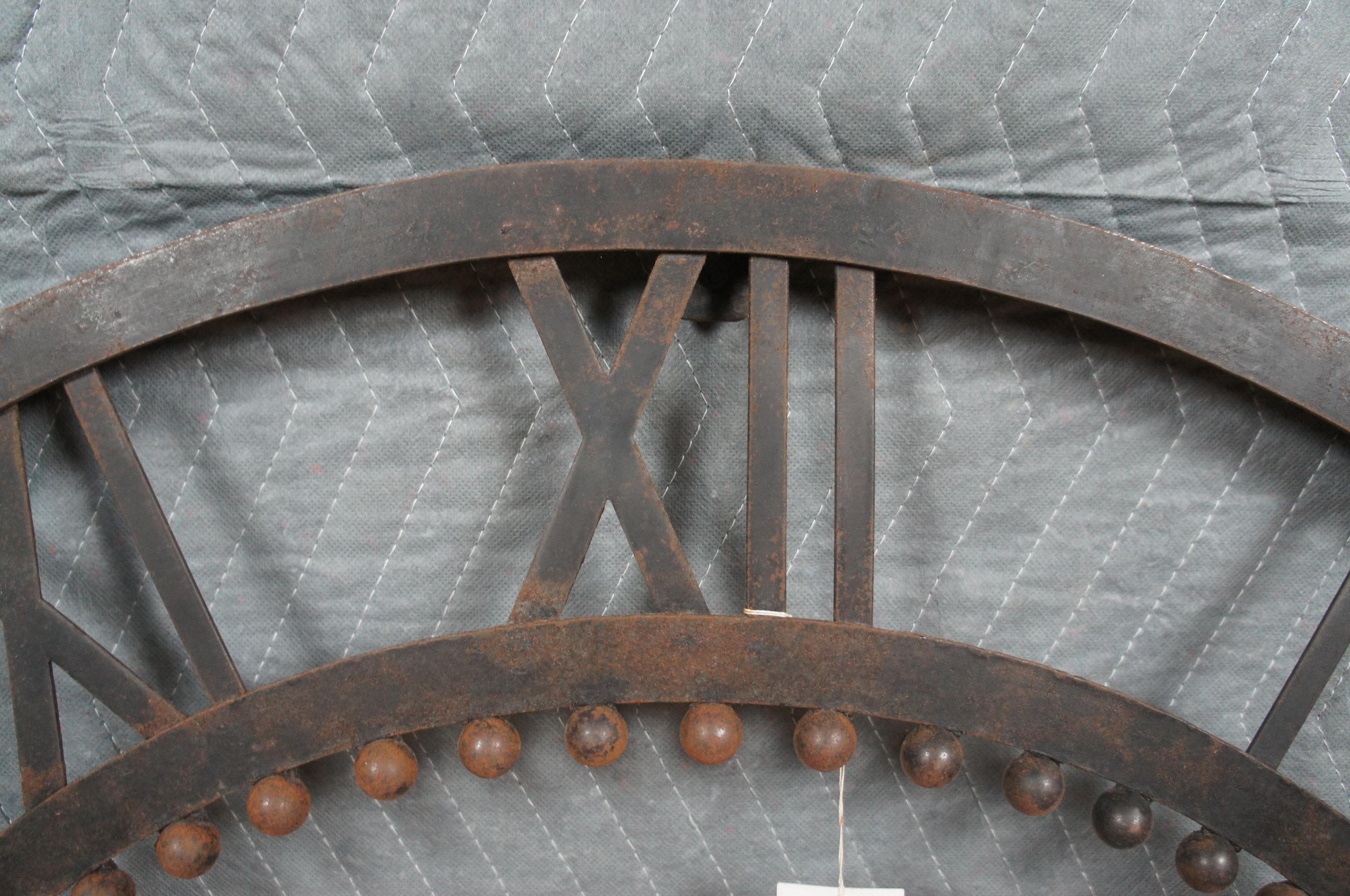 20th Century Global Views Sculptural Rustic Iron Decorative Wall Cock Roman Numerals